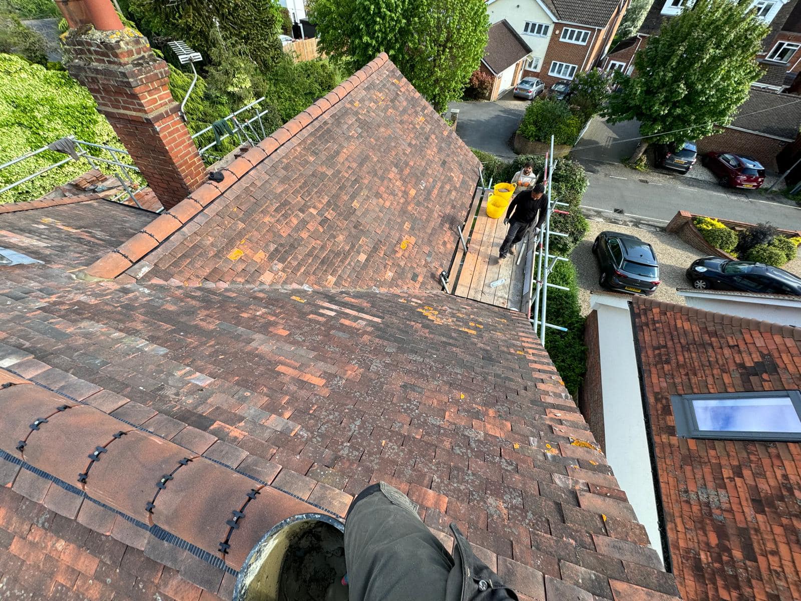 Professional roofers working on a property in London - KS Roof Master