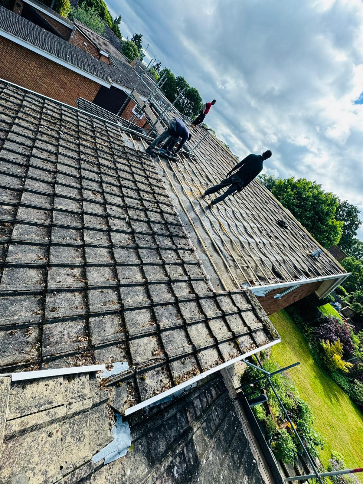 Professional roofers working on a property in London - KS Roof Master