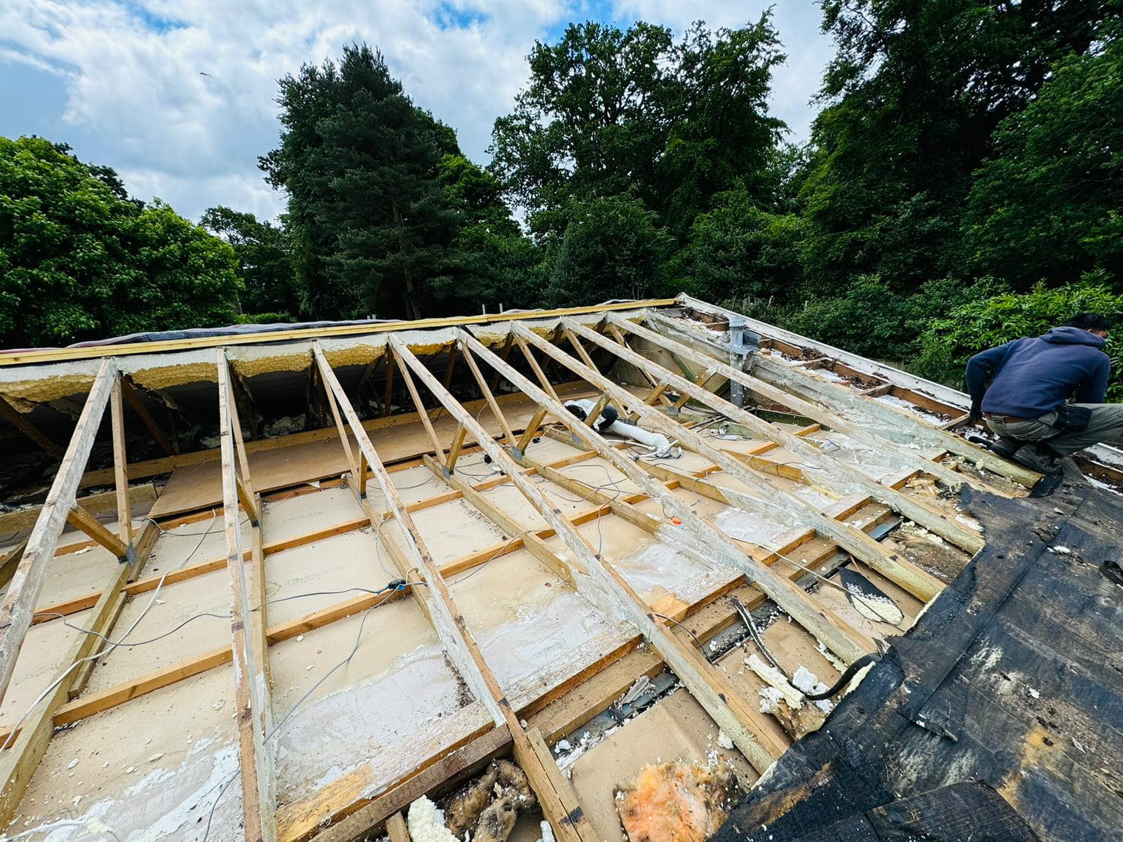 Professional roofers working on a property in London - KS Roof Master