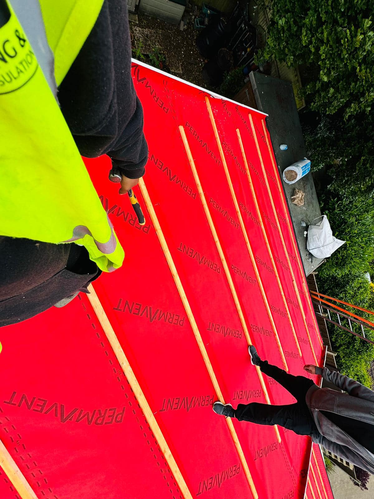 Professional roofers working on a property in London - KS Roof Master