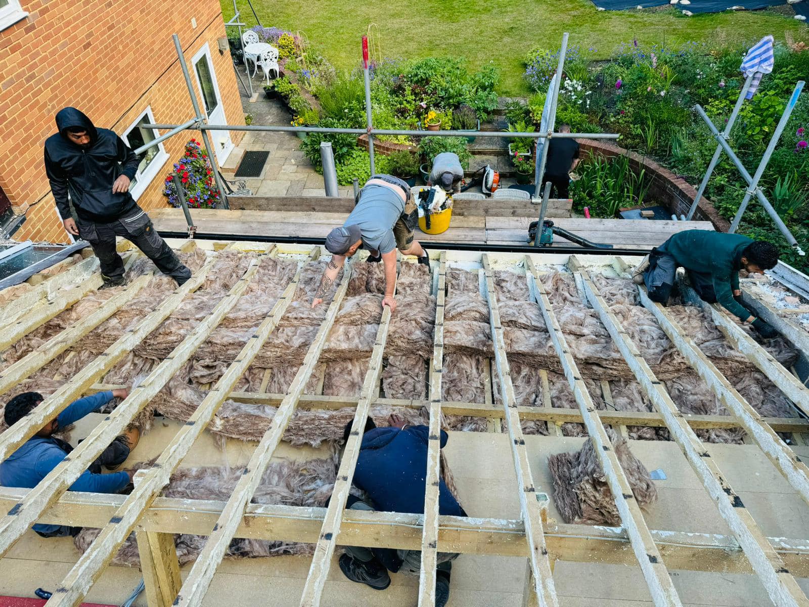 Professional roofers working on a property in London - KS Roof Master
