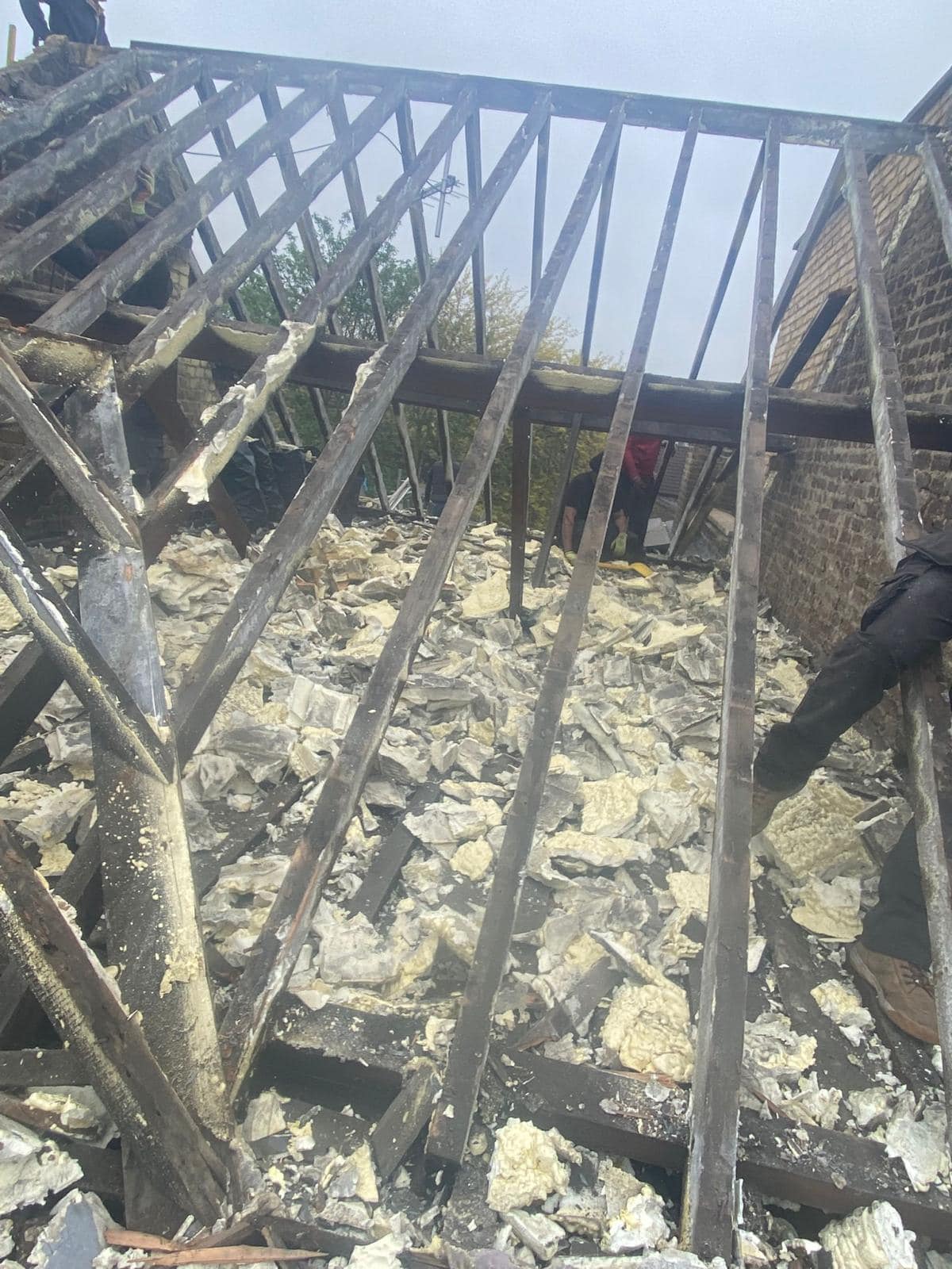 Professional roofers working on a property in London - KS Roof Master