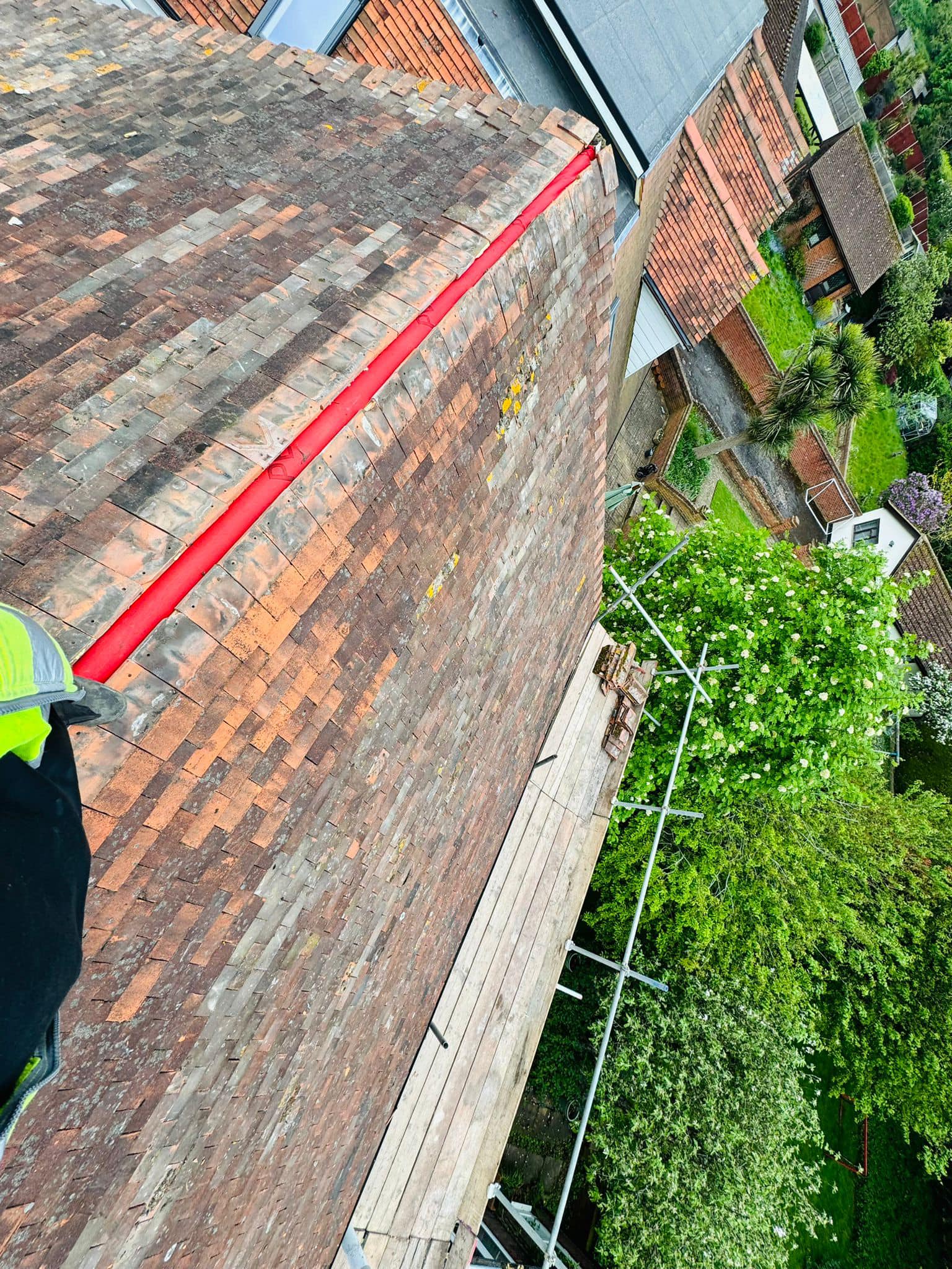 Professional roofers working on a property in London - KS Roof Master