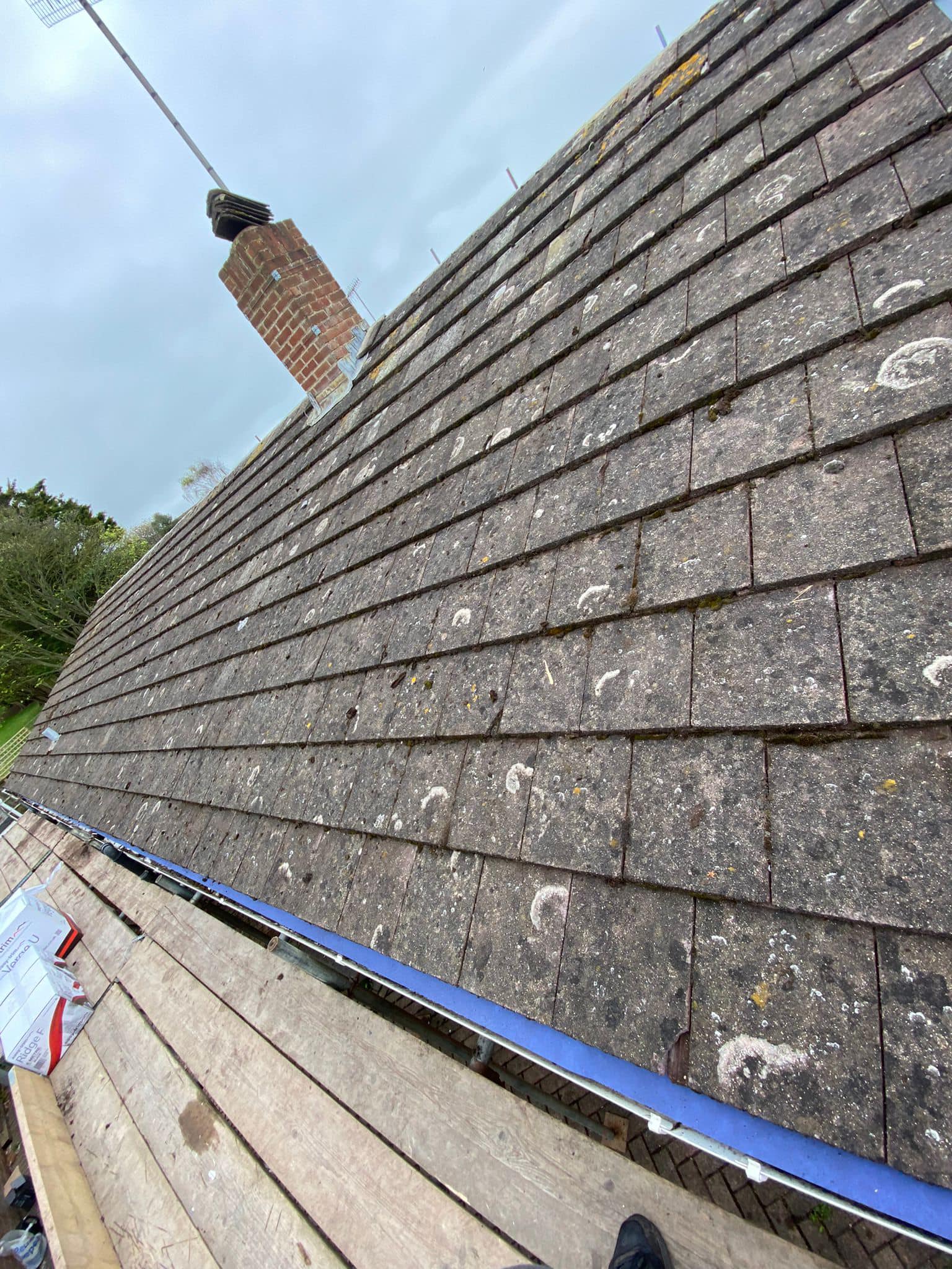 Professional roofers working on a property in London - KS Roof Master