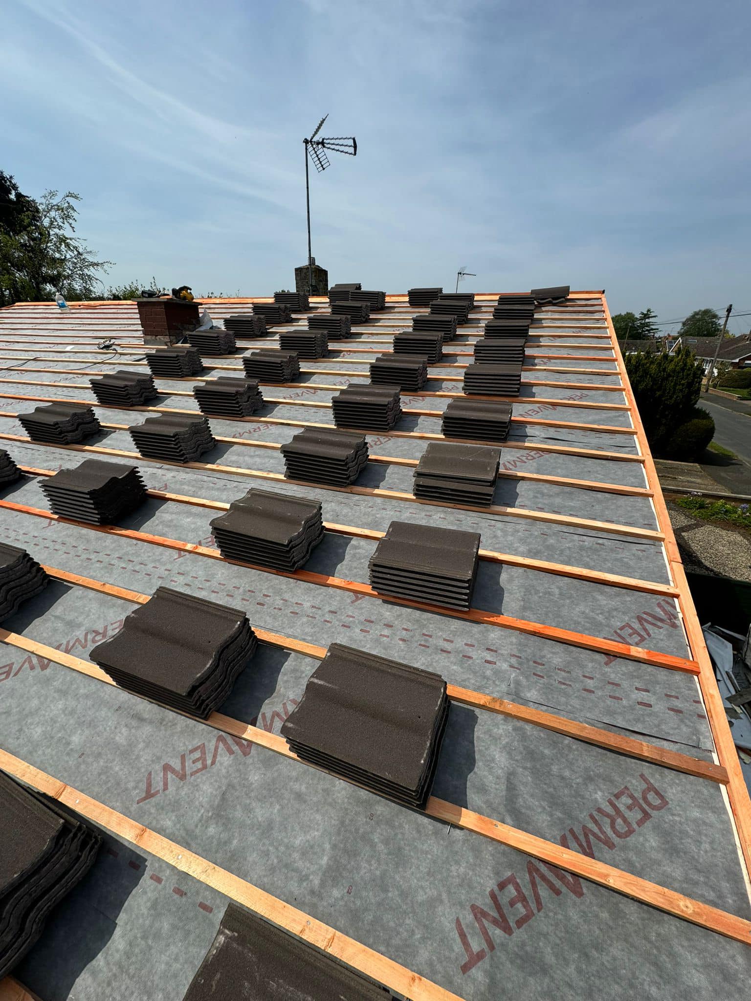 Professional roofers working on a property in London - KS Roof Master