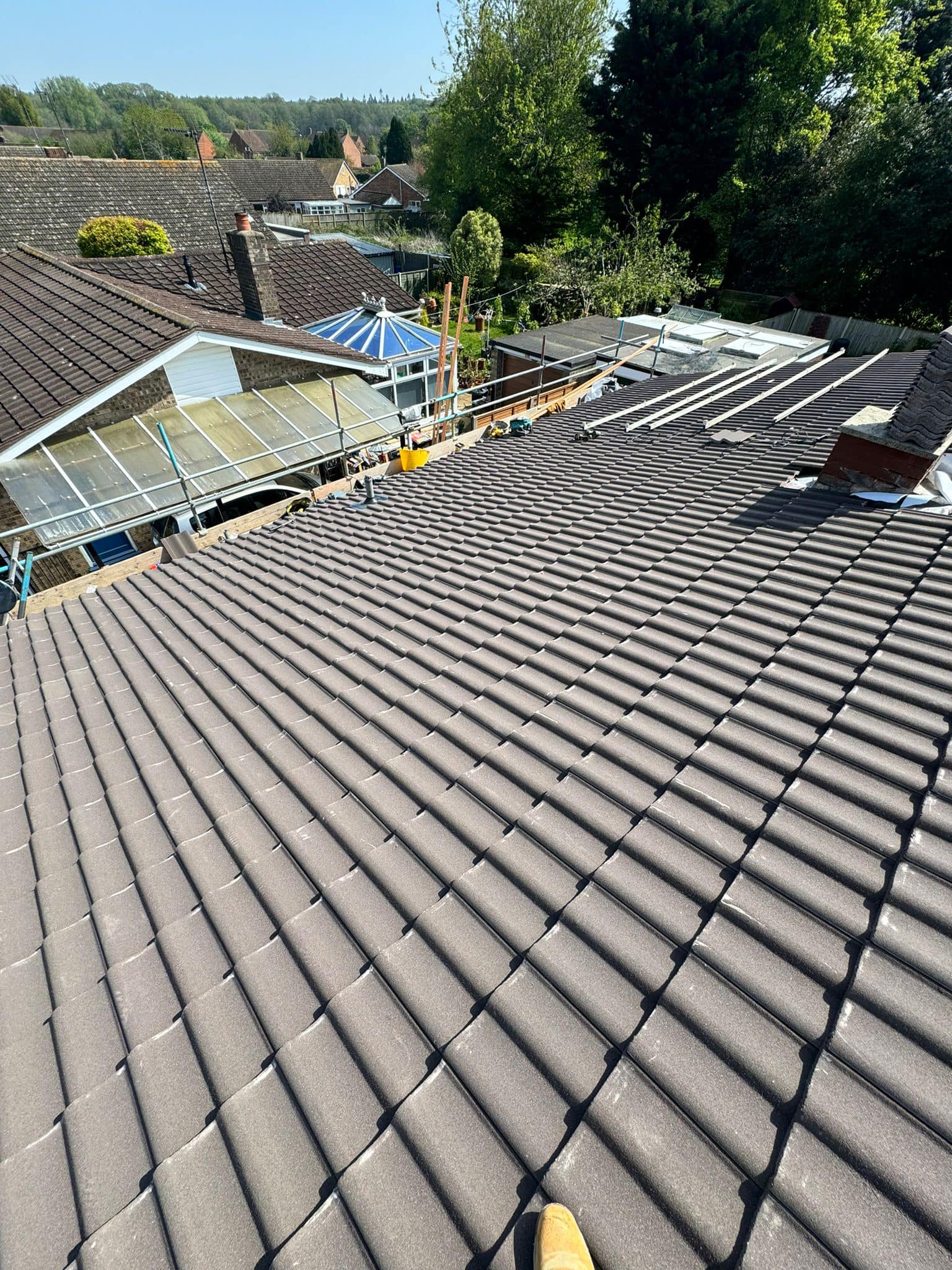 Professional roofers working on a property in London - KS Roof Master