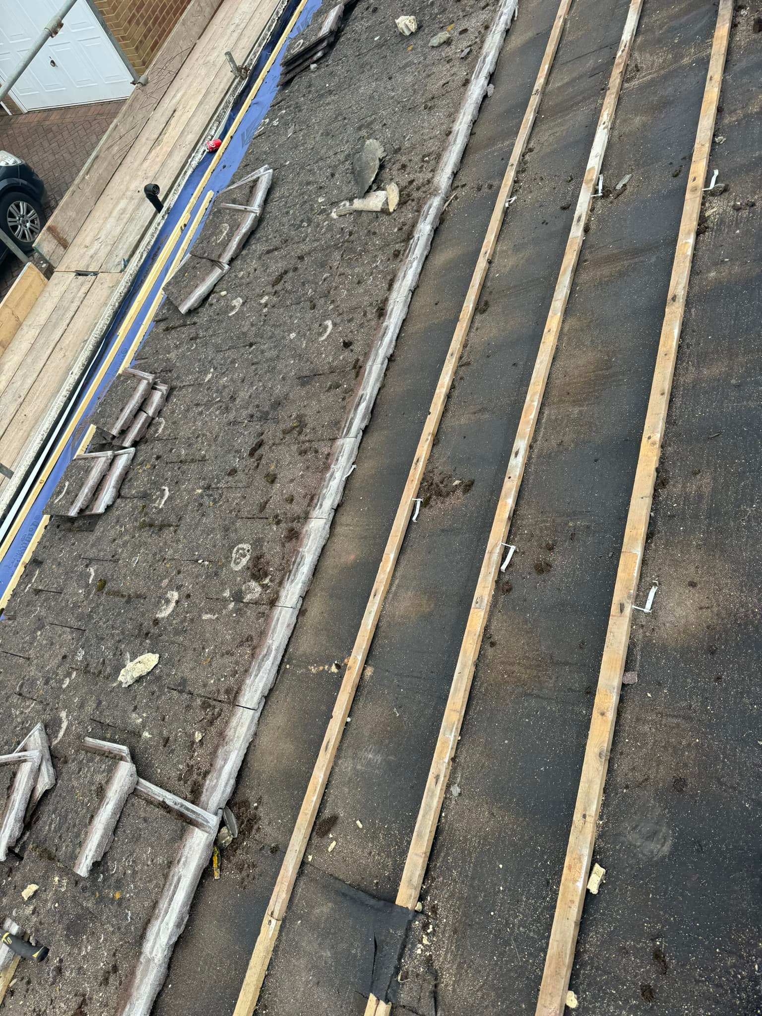 Professional roofers working on a property in London - KS Roof Master
