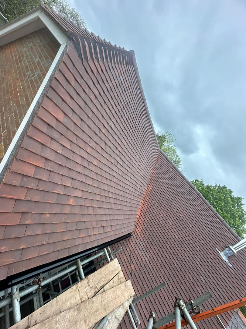 Professional roofers working on a property in London - KS Roof Master