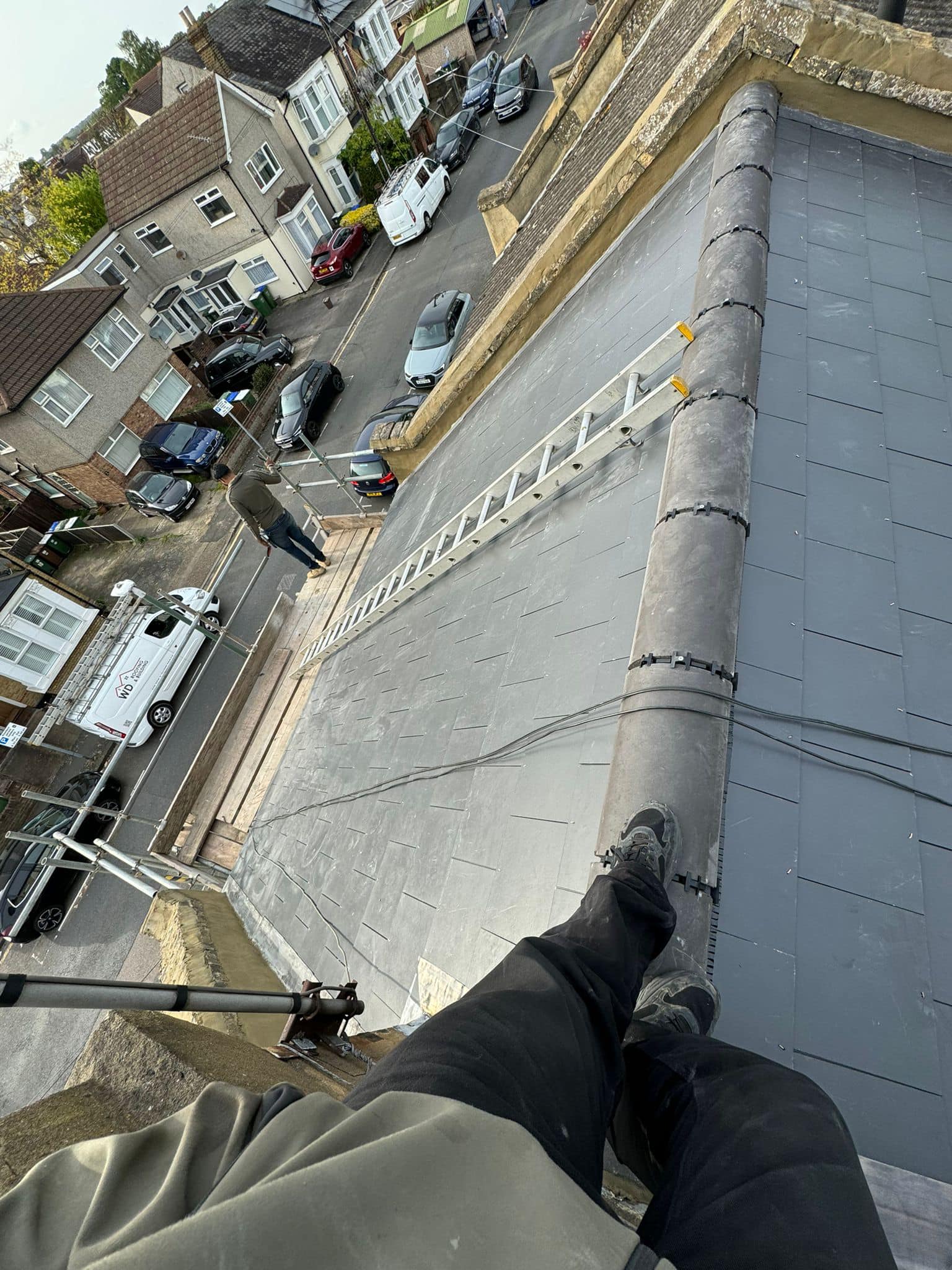 Professional roofers working on a property in London - KS Roof Master