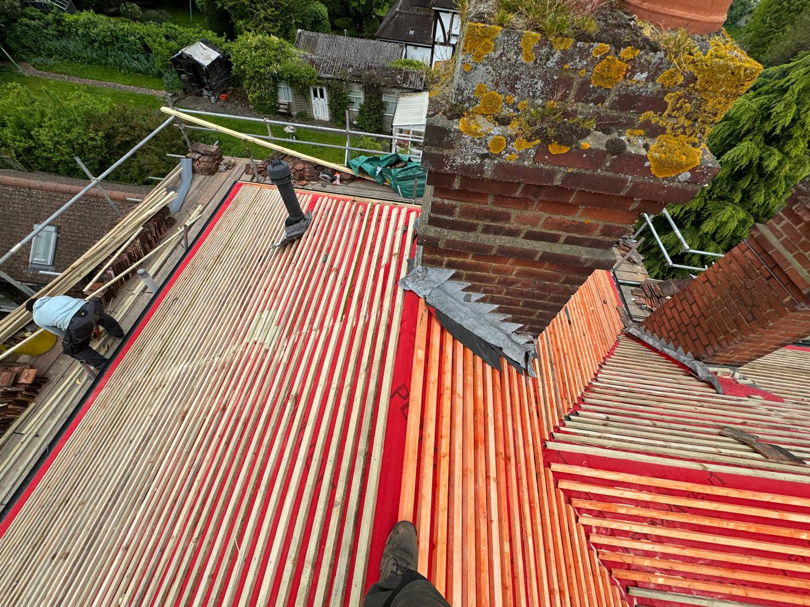 Professional roofers working on a property in London - KS Roof Master