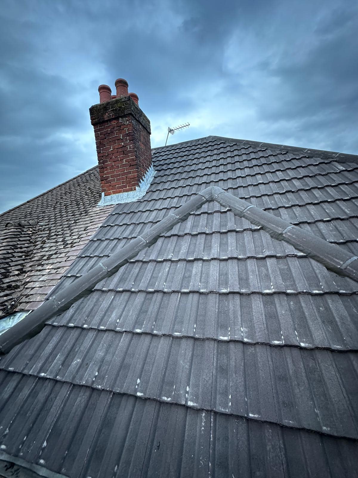 Professional roofers working on a property in London - KS Roof Master