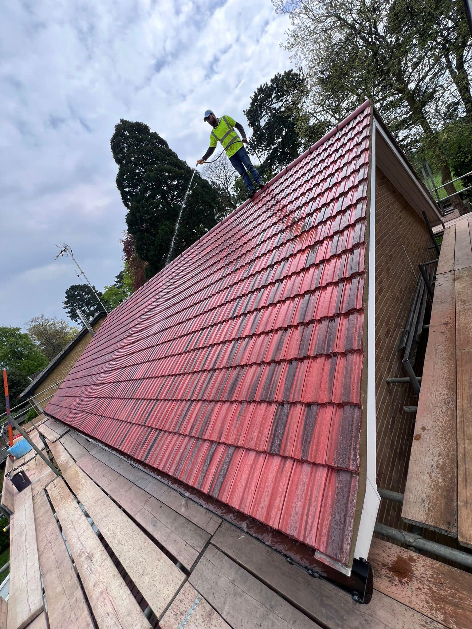 Professional roofers working on a property in London - KS Roof Master