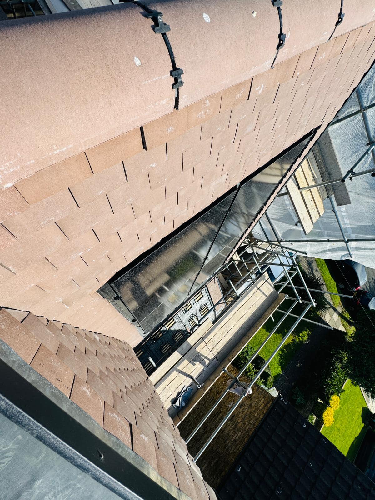 Professional roofers working on a property in London - KS Roof Master