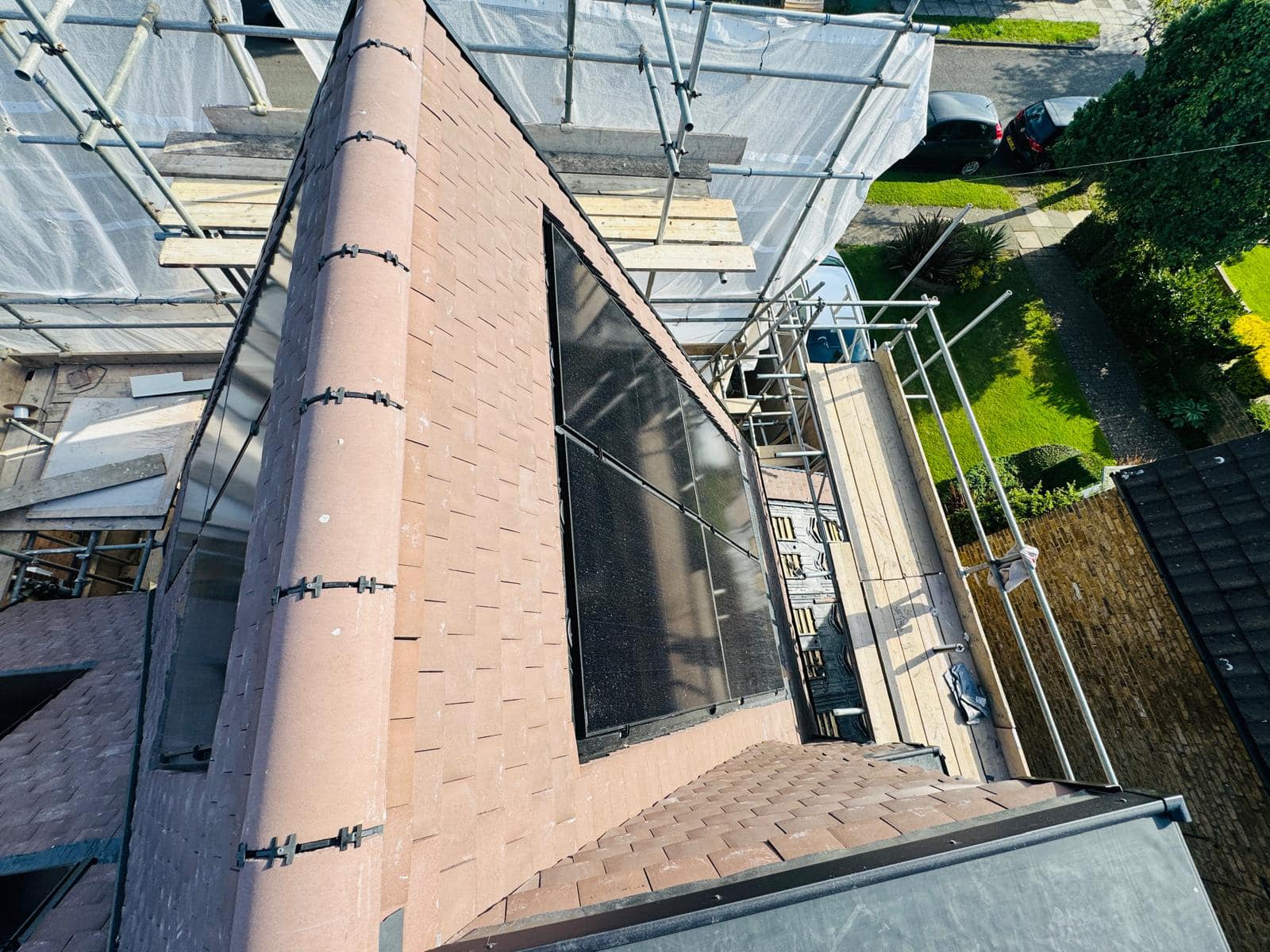 Professional roofers working on a property in London - KS Roof Master