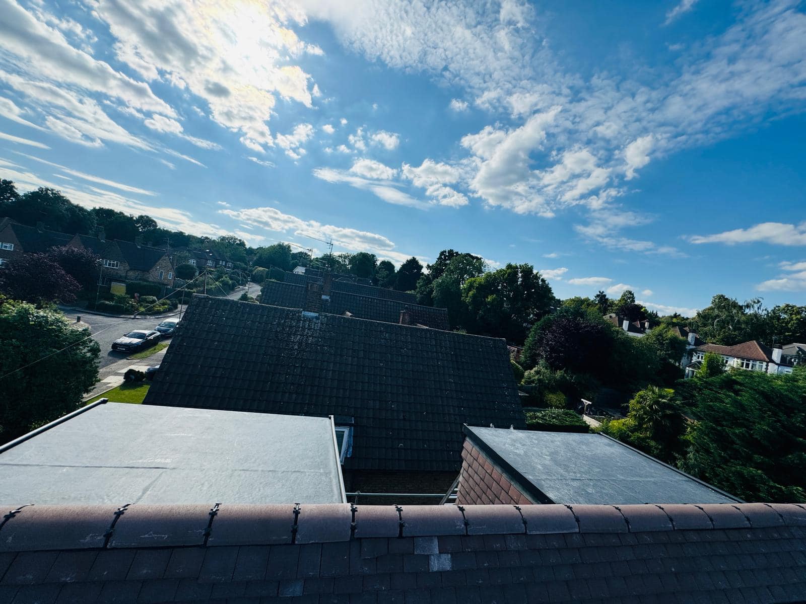 Professional roofers working on a property in London - KS Roof Master