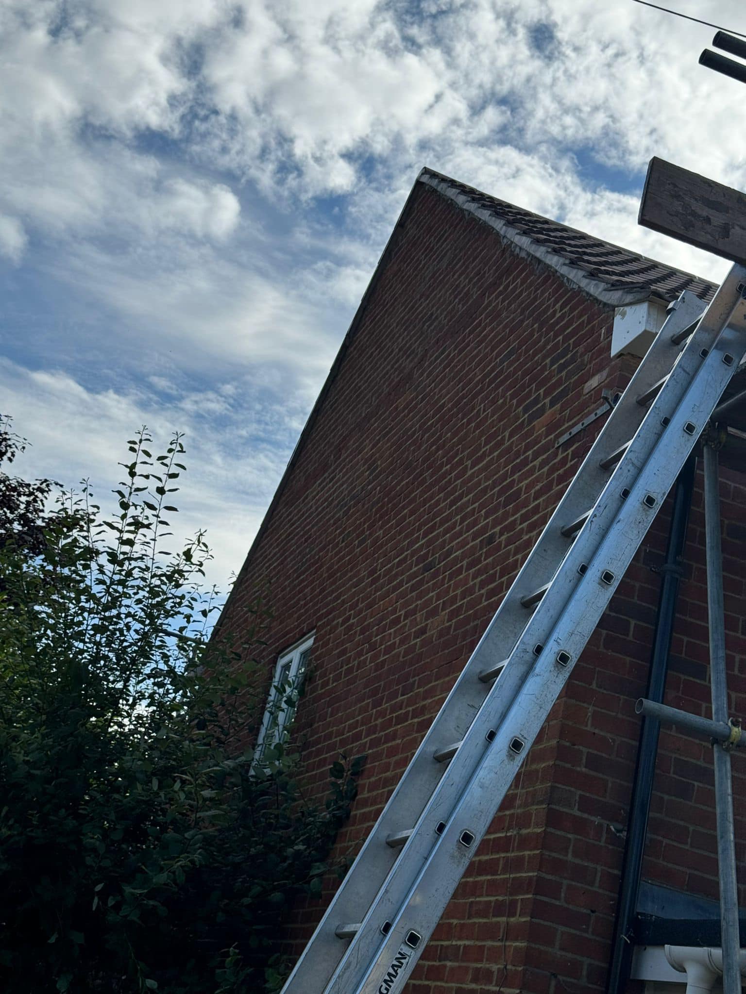 Professional roofers working on a property in London - KS Roof Master