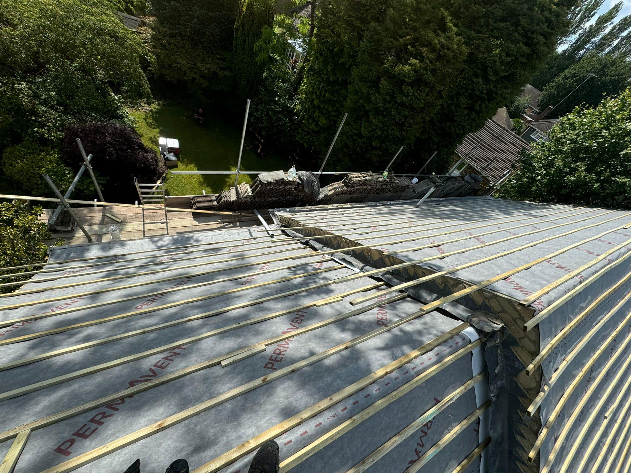 Professional roofers working on a property in London - KS Roof Master
