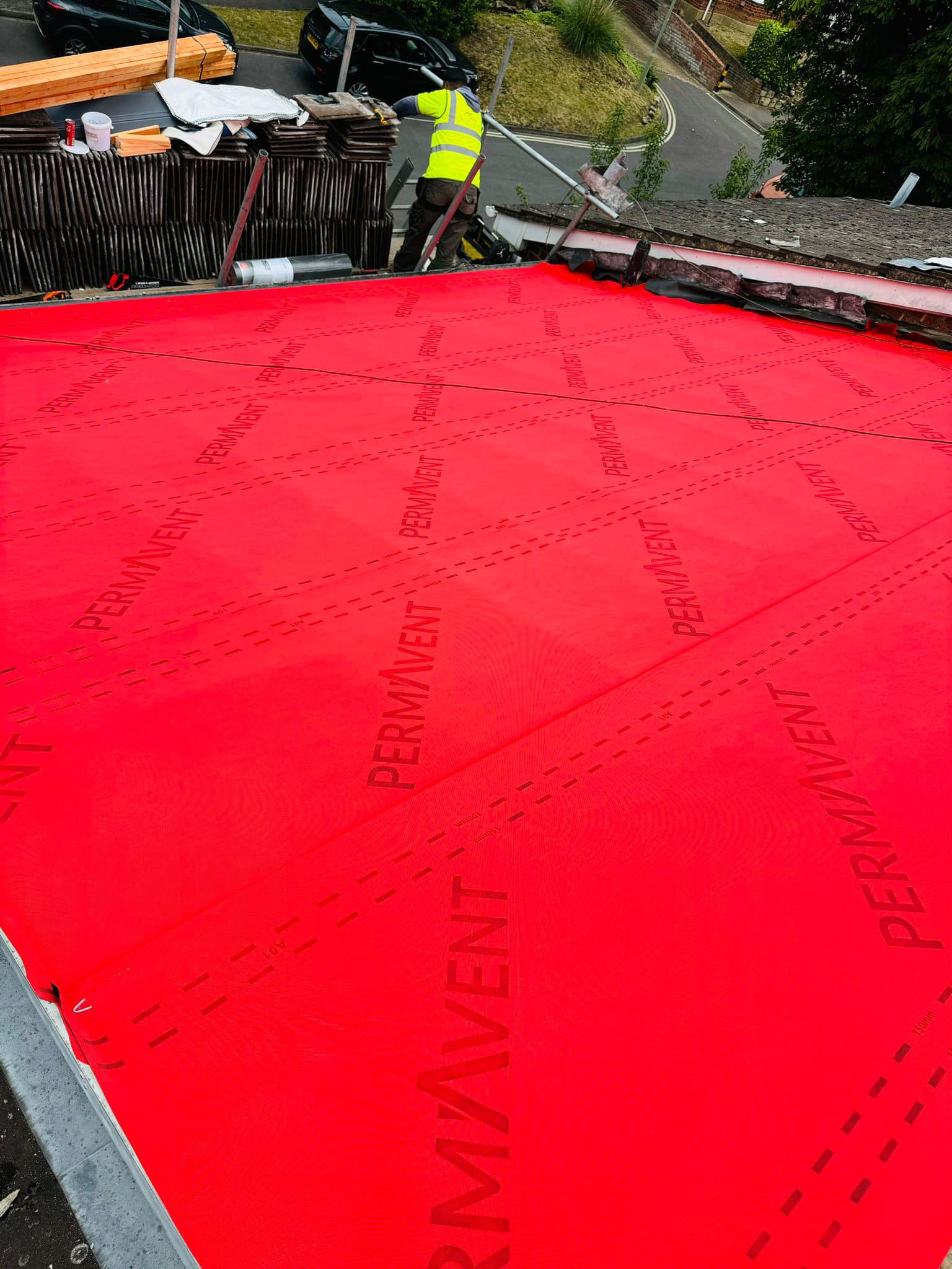 Professional roofers working on a property in London - KS Roof Master