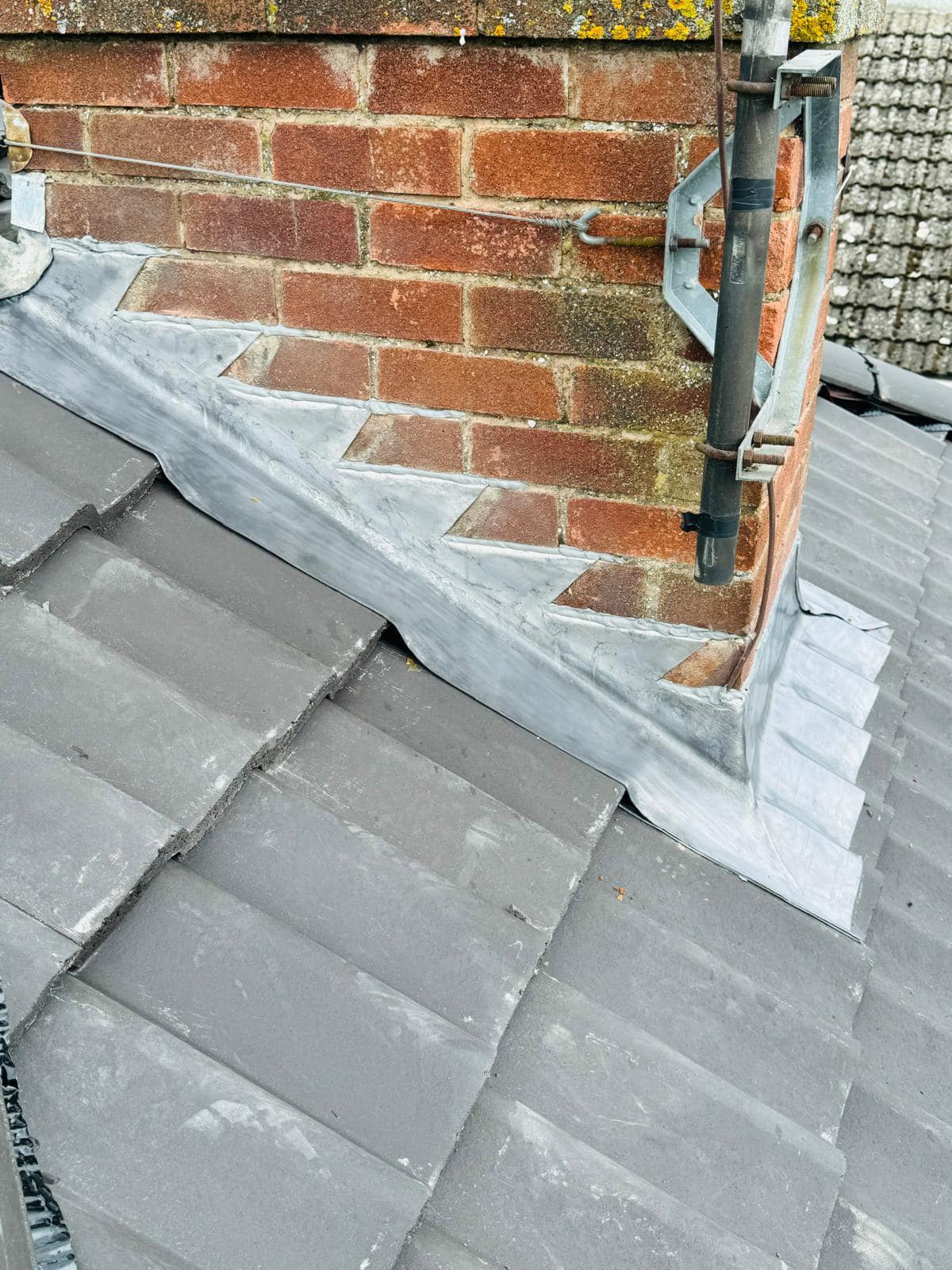 Professional roofers working on a property in London - KS Roof Master