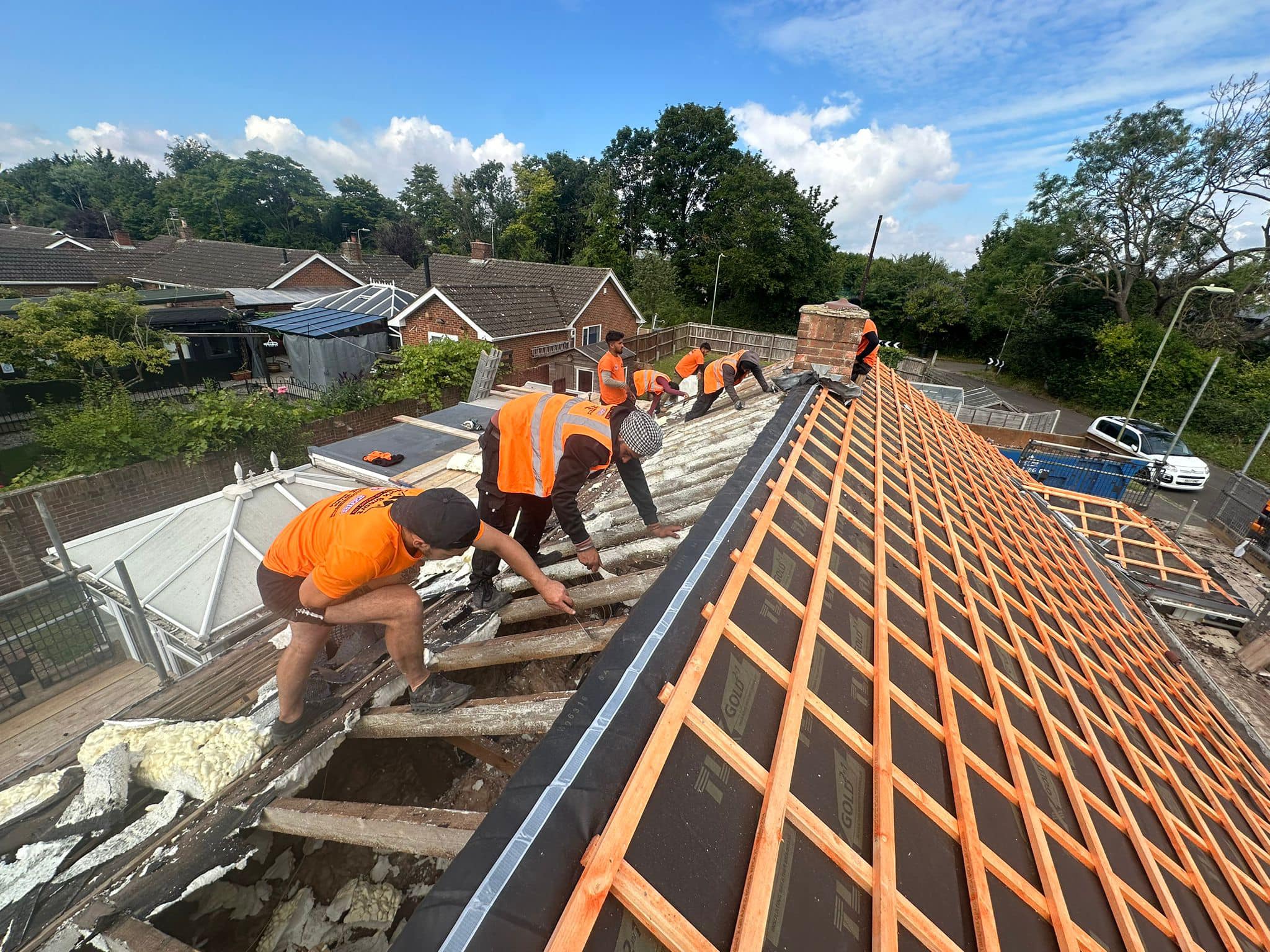 Professional roofers working on a property in London - KS Roof Master