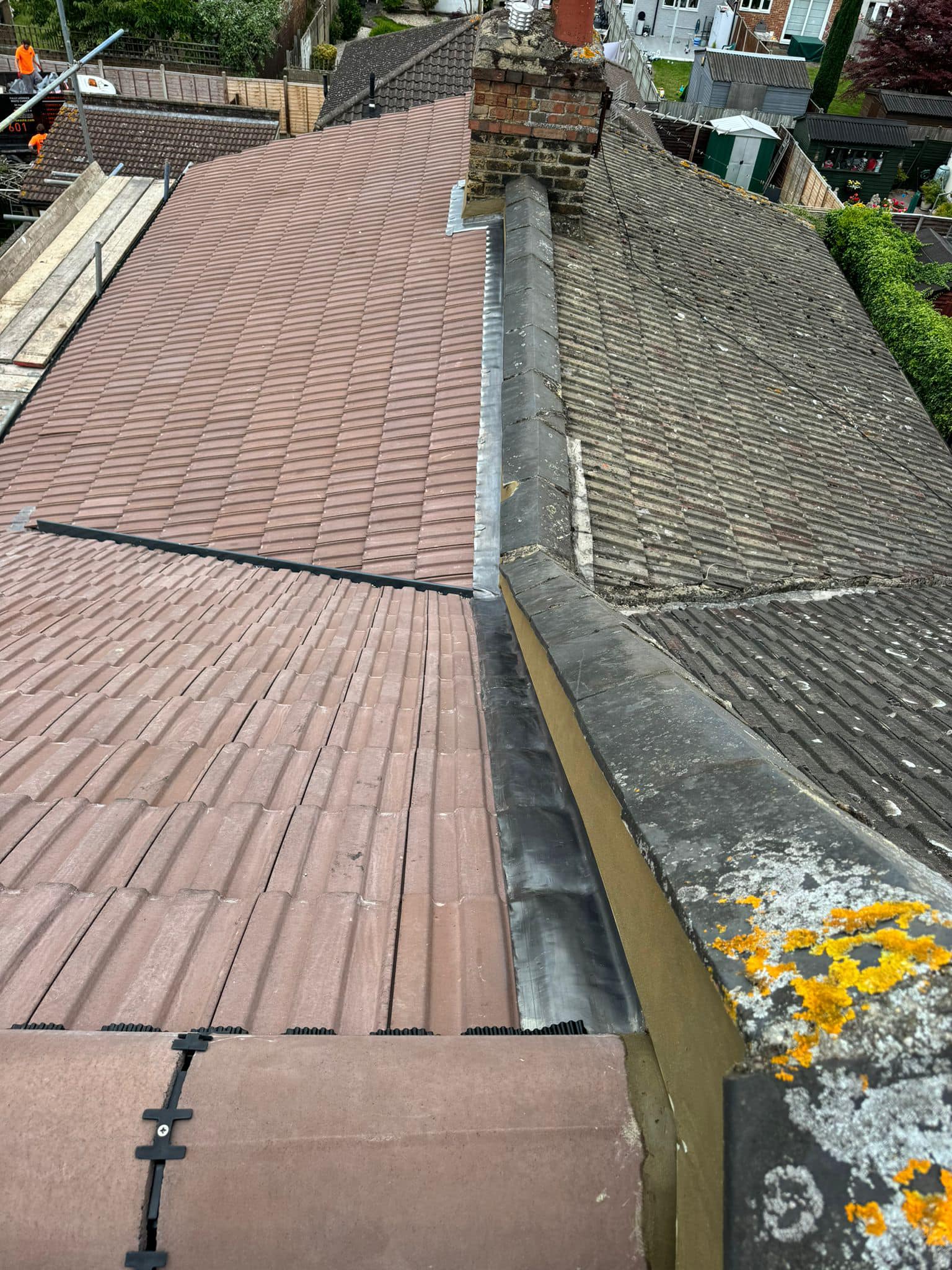 Professional roofers working on a property in London - KS Roof Master