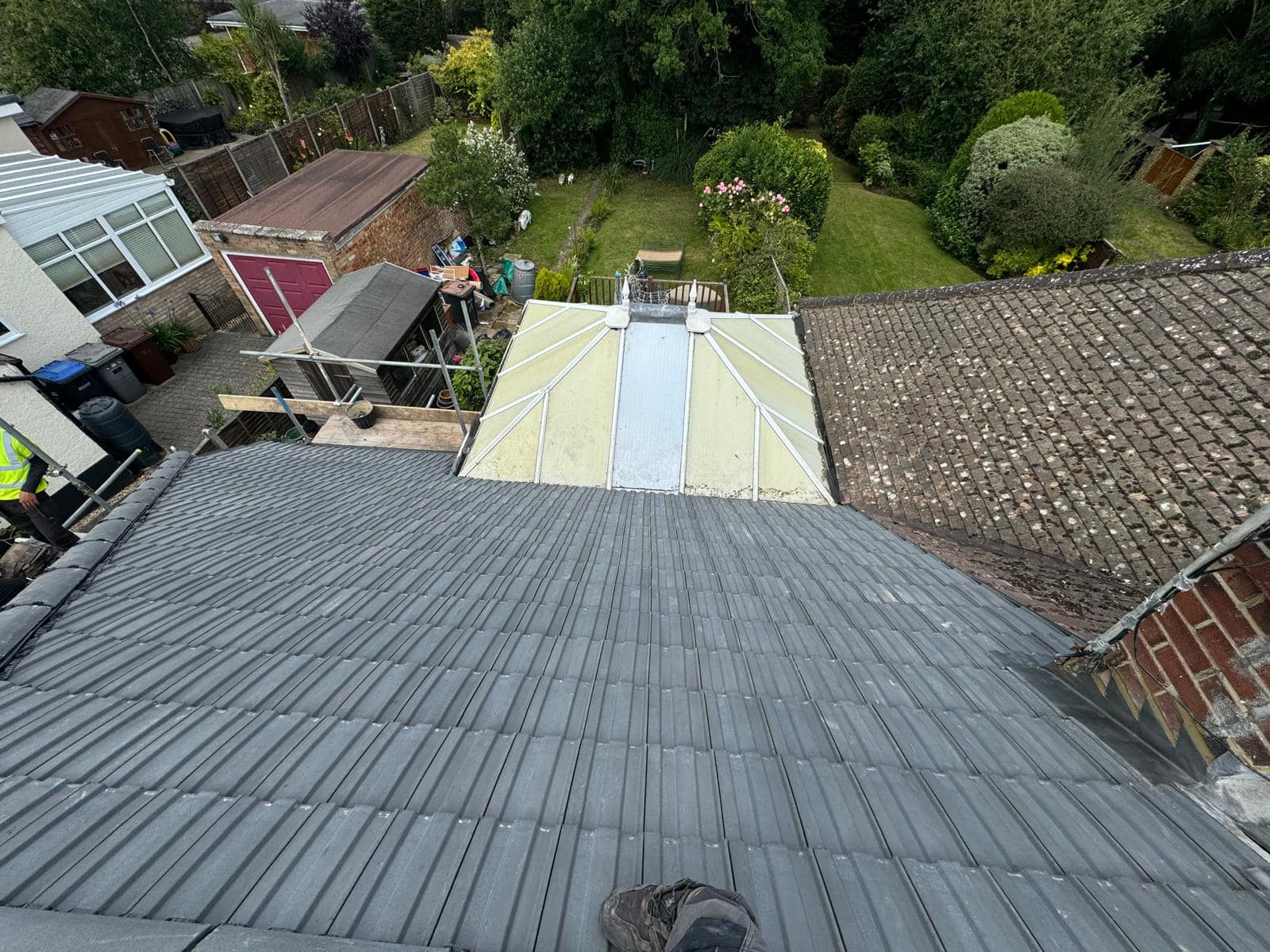 Professional roofers working on a property in London - KS Roof Master