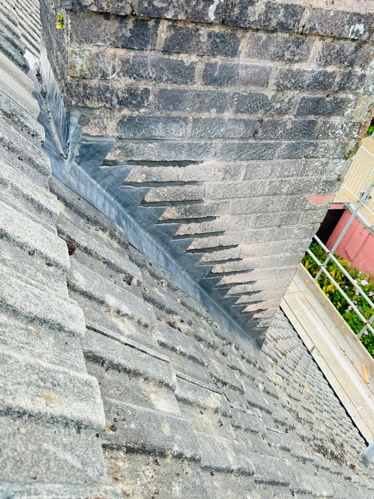 Professional roofers working on a property in London - KS Roof Master