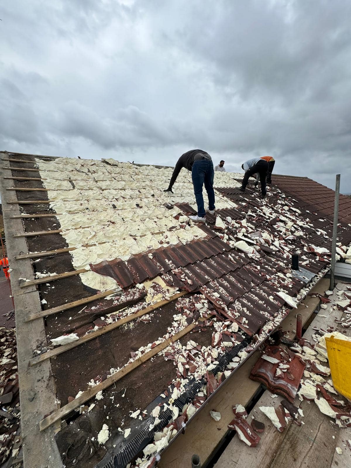 Professional roofers working on a property in London - KS Roof Master