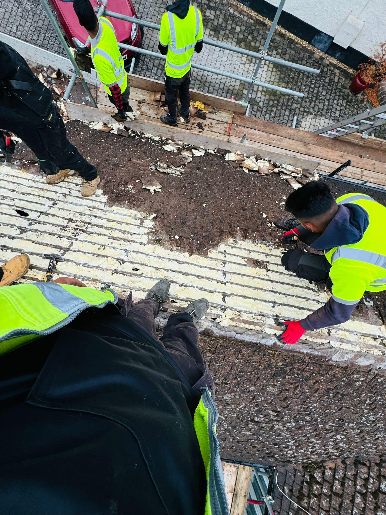 Professional roofers working on a property in London - KS Roof Master