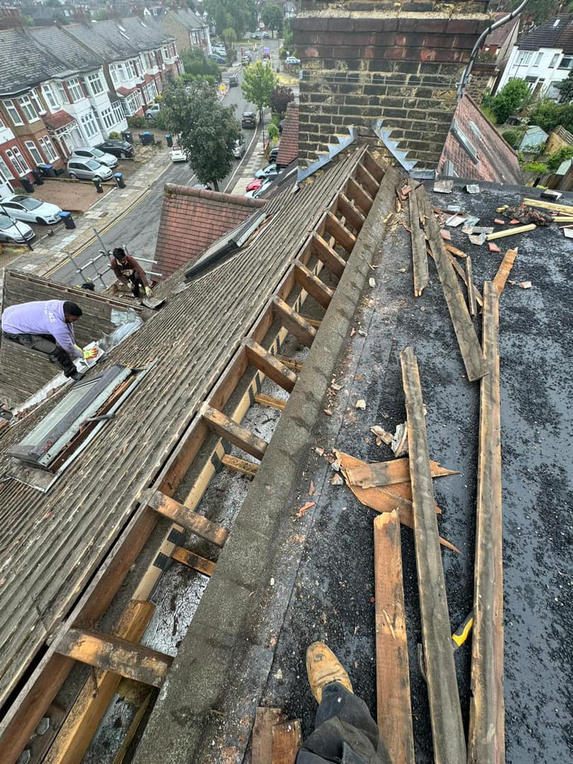Professional roofers working on a property in London - KS Roof Master