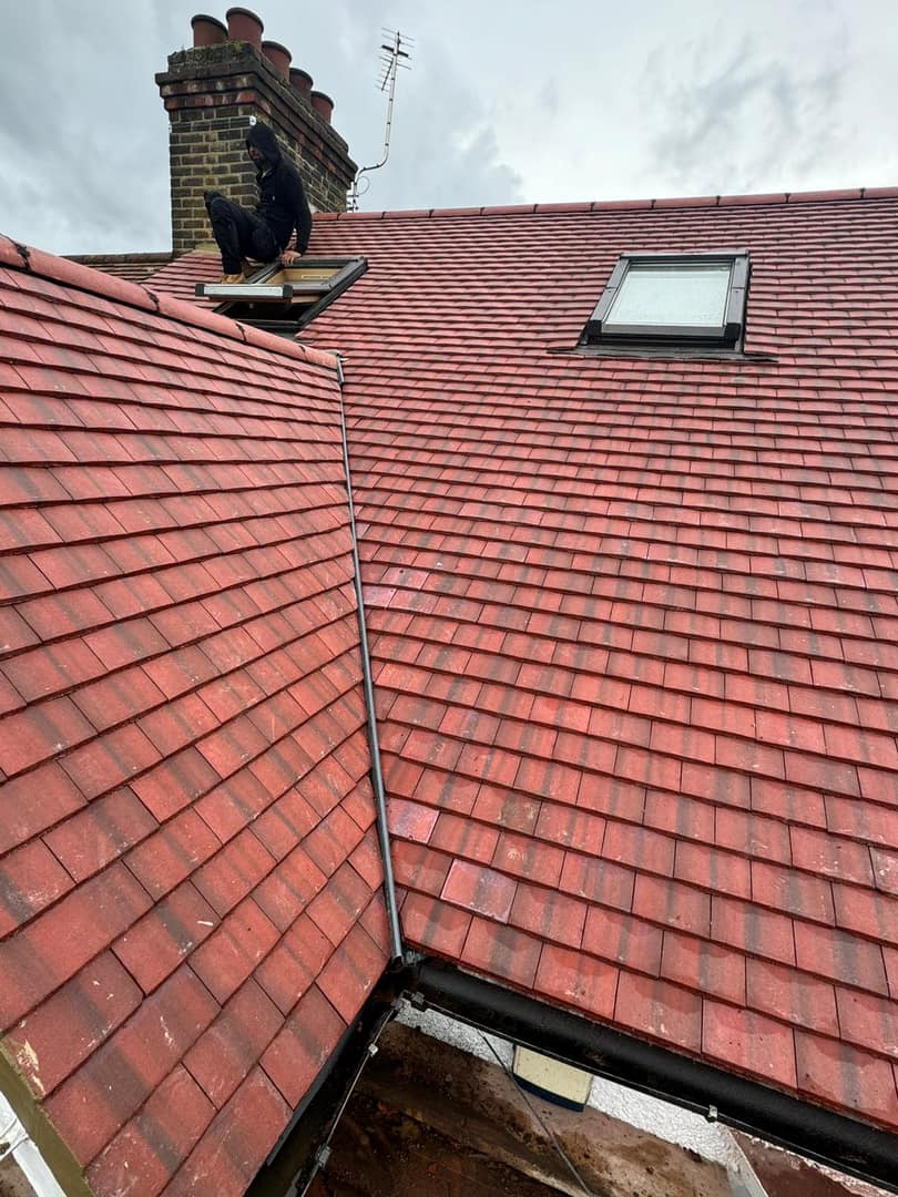 Professional roofers working on a property in London - KS Roof Master