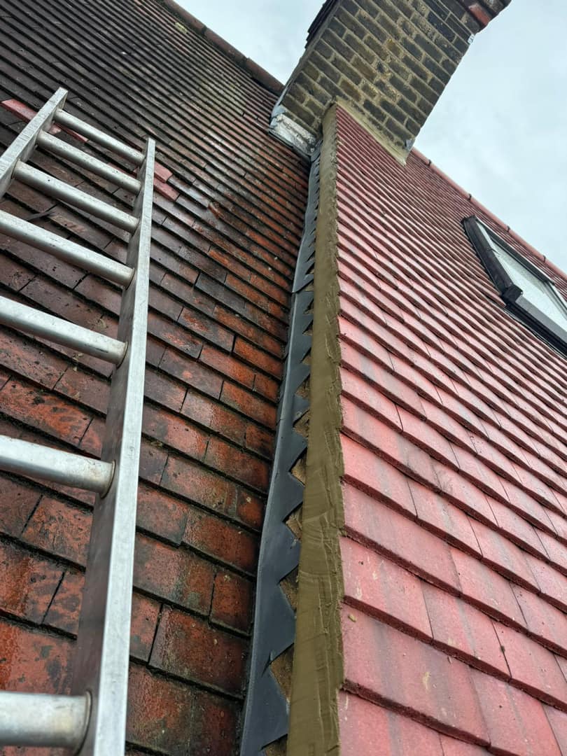 Professional roofers working on a property in London - KS Roof Master