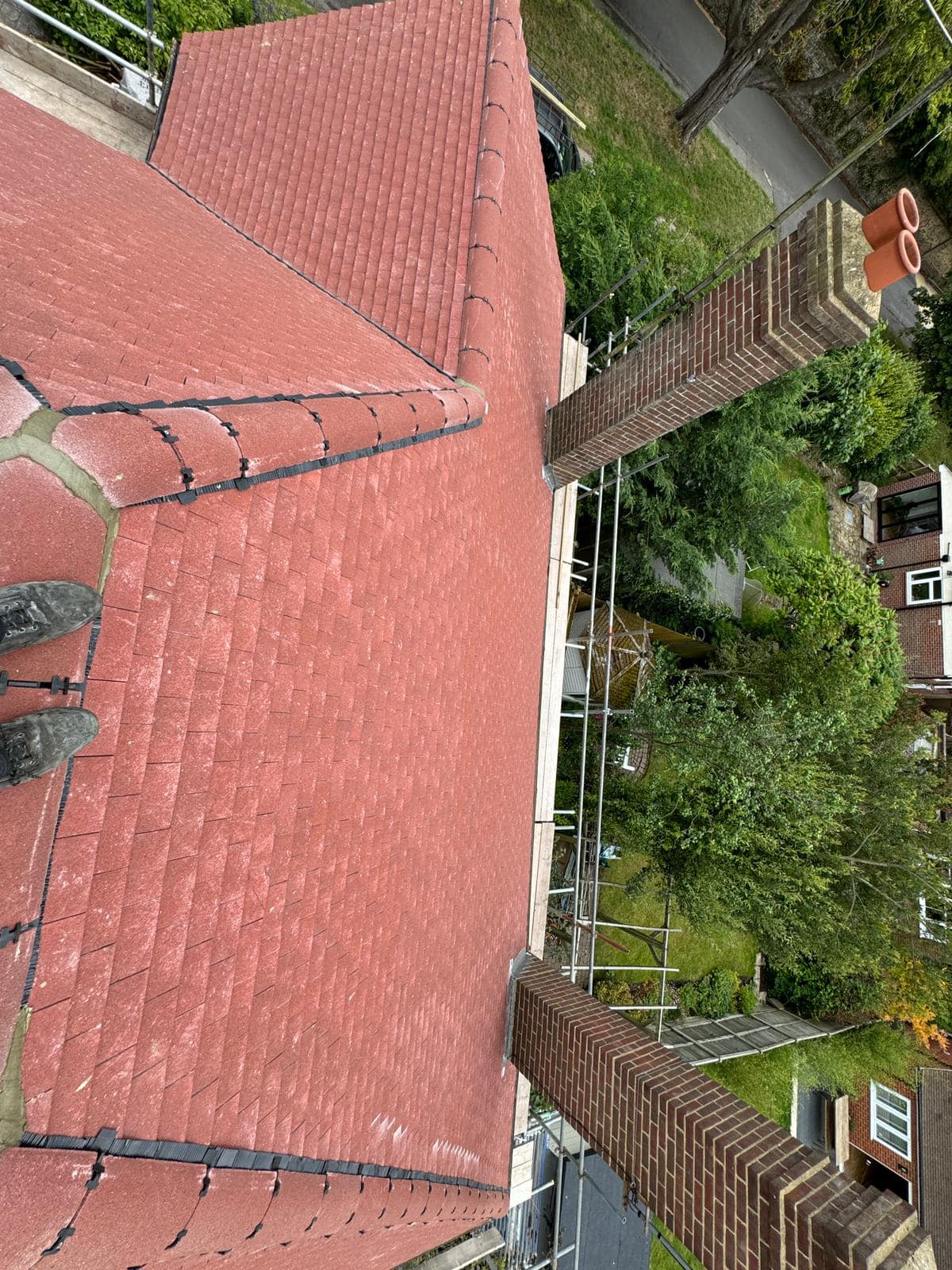 Professional roofers working on a property in London - KS Roof Master