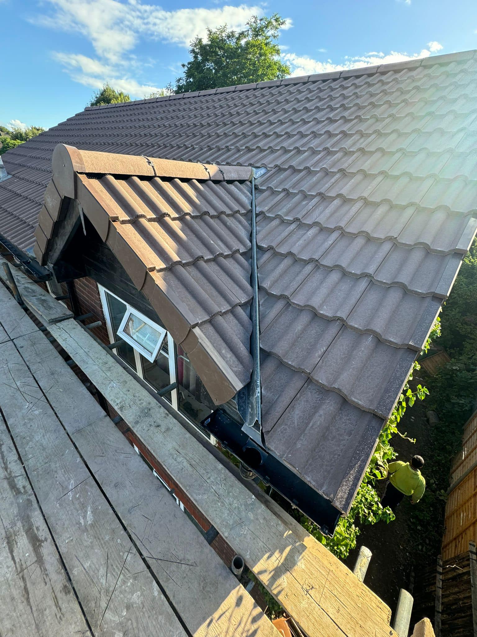 Professional roofers working on a property in London - KS Roof Master