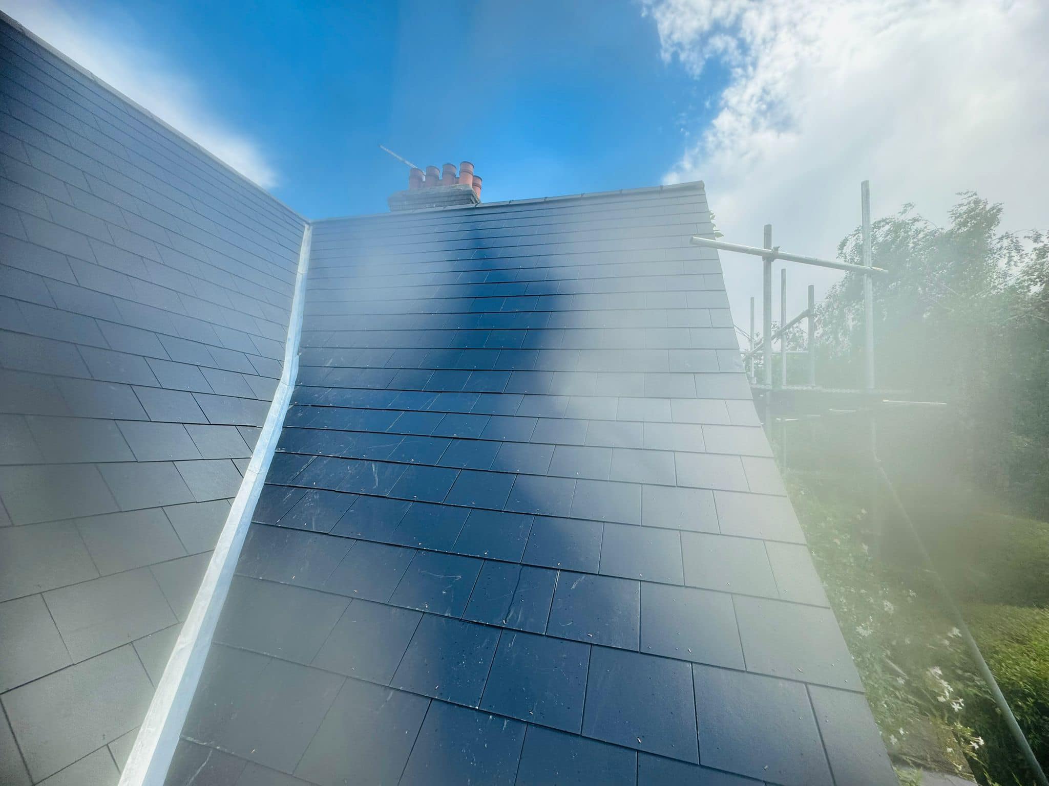 Professional roofers working on a property in London - KS Roof Master