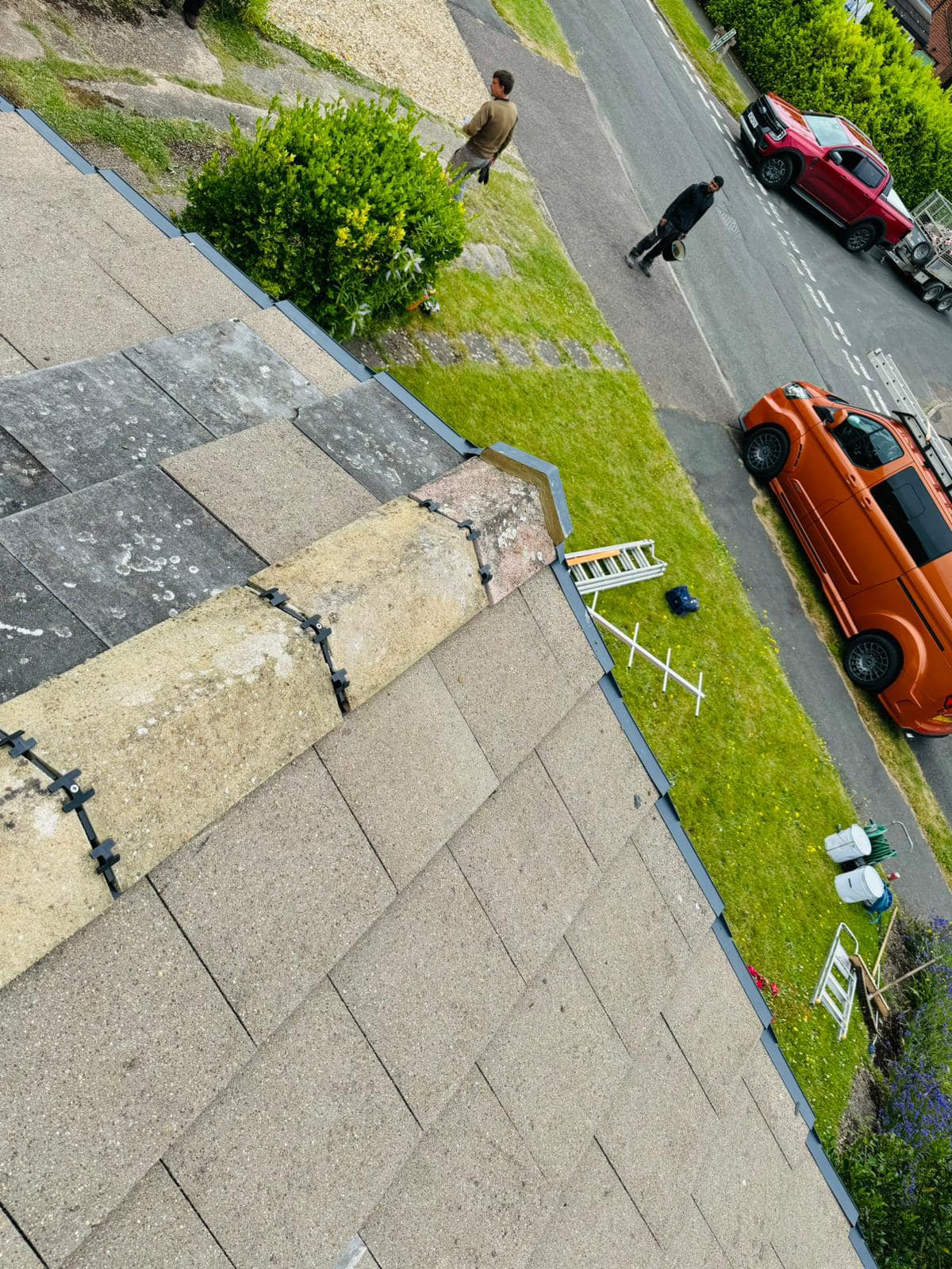 Professional roofers working on a property in London - KS Roof Master