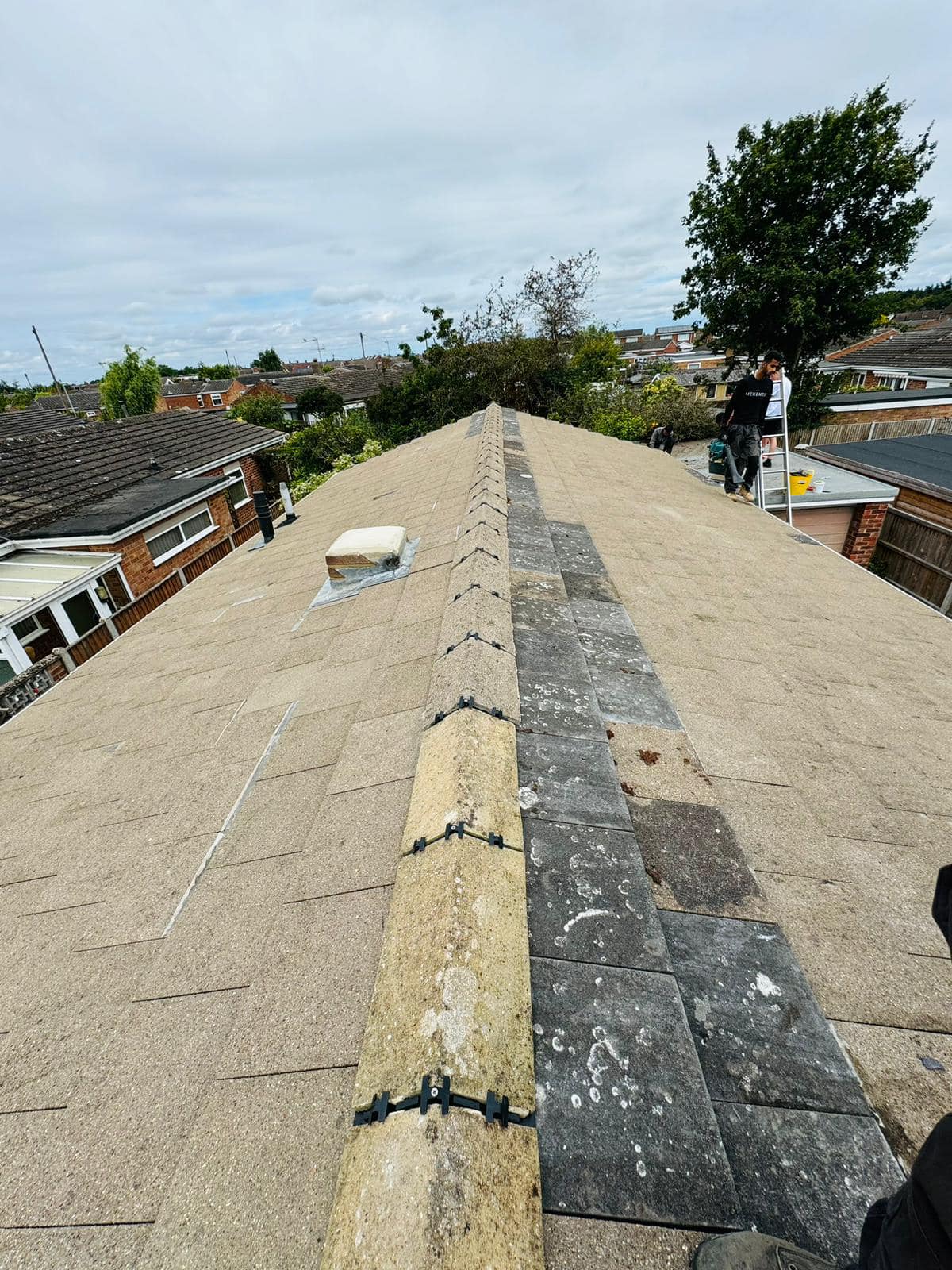 Professional roofers working on a property in London - KS Roof Master