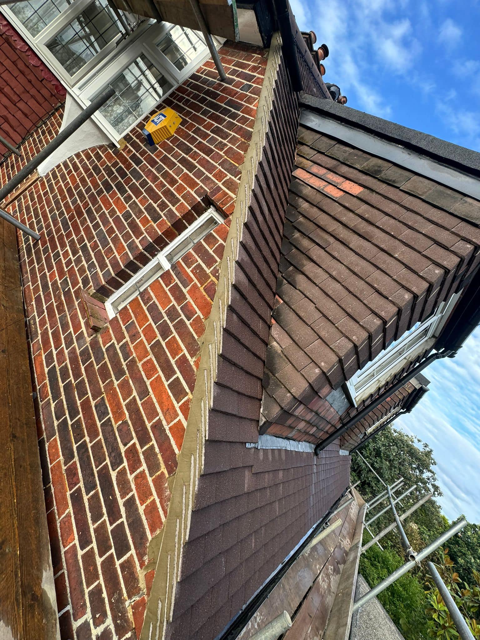 Professional roofers working on a property in London - KS Roof Master
