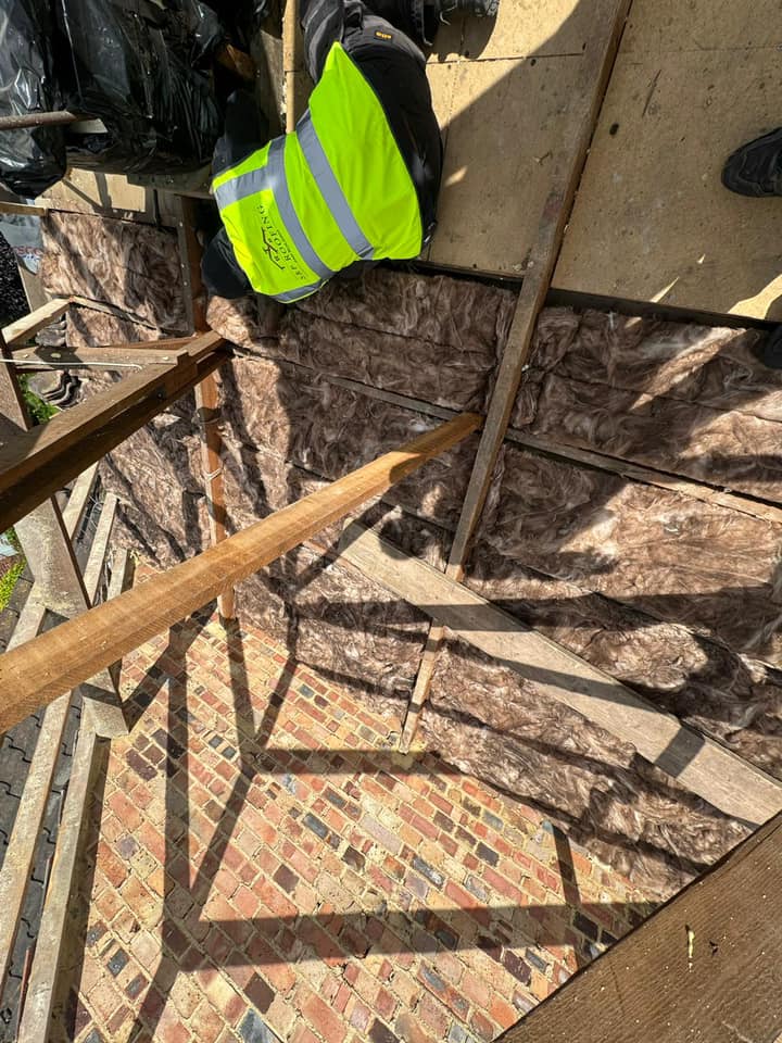 Professional roofers working on a property in London - KS Roof Master