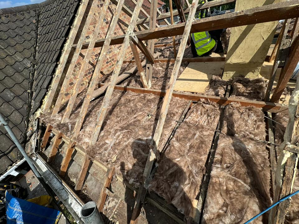 Professional roofers working on a property in London - KS Roof Master