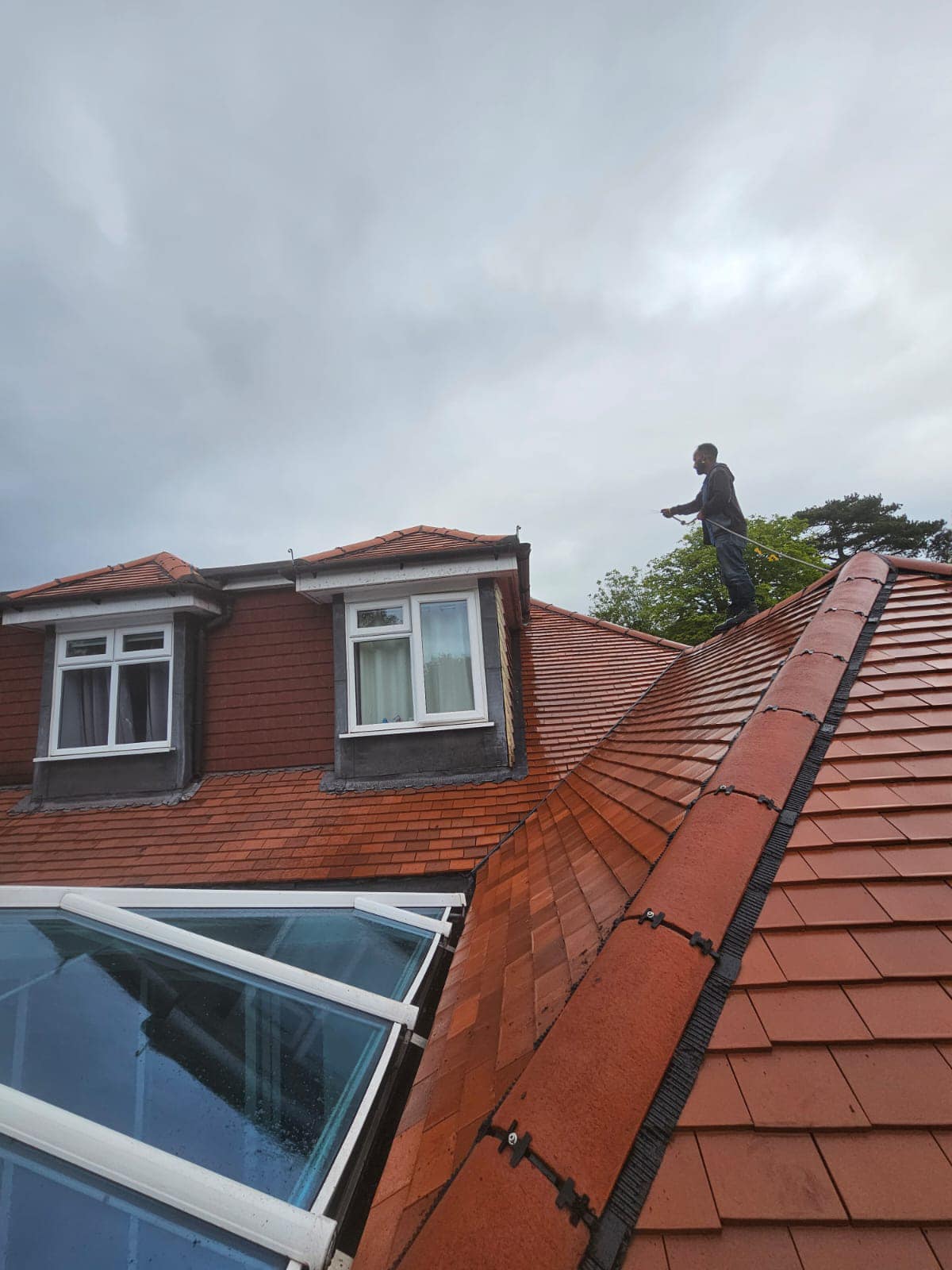 Professional roofers working on a property in London - KS Roof Master
