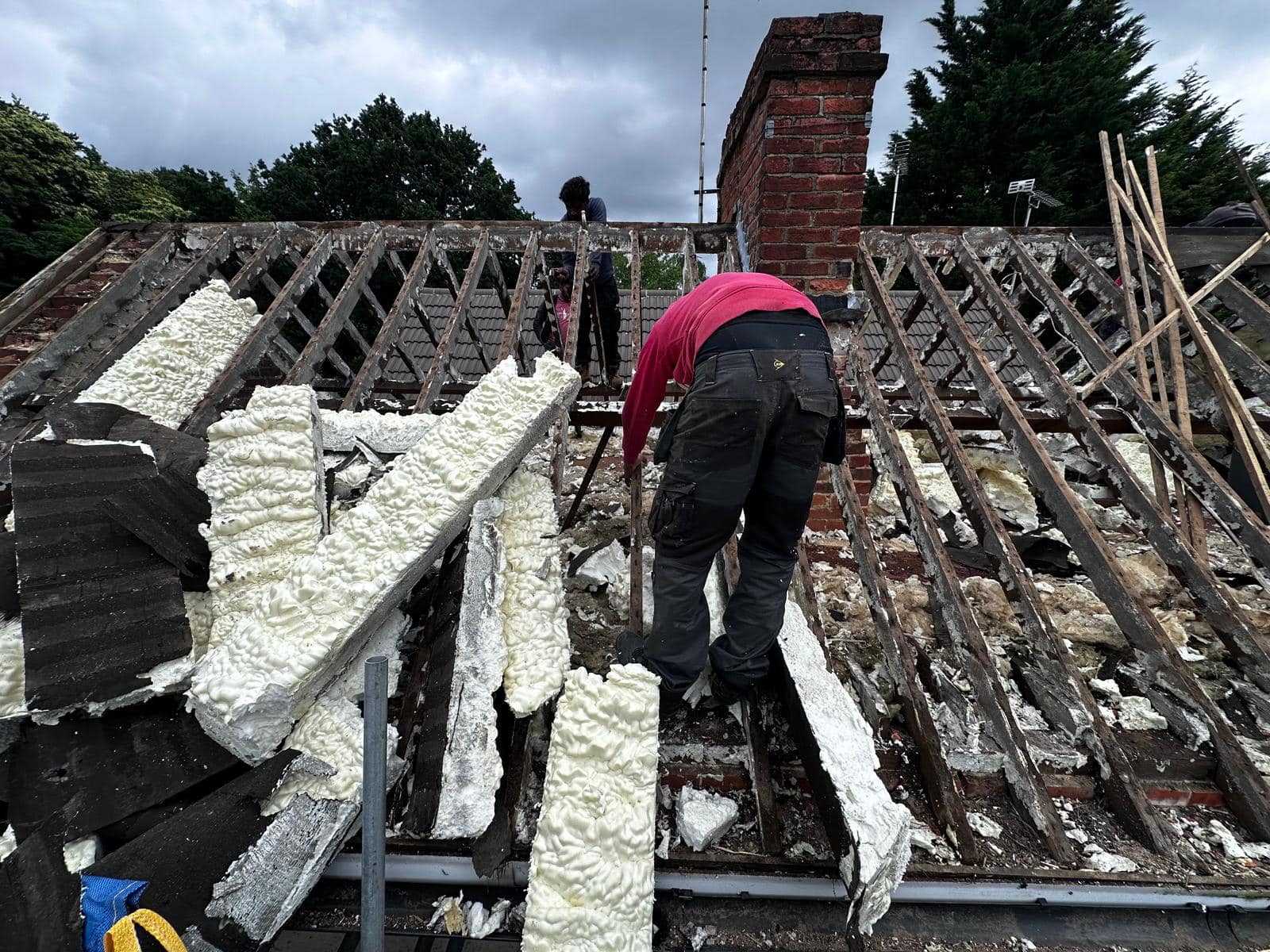 Professional roofers working on a property in London - KS Roof Master