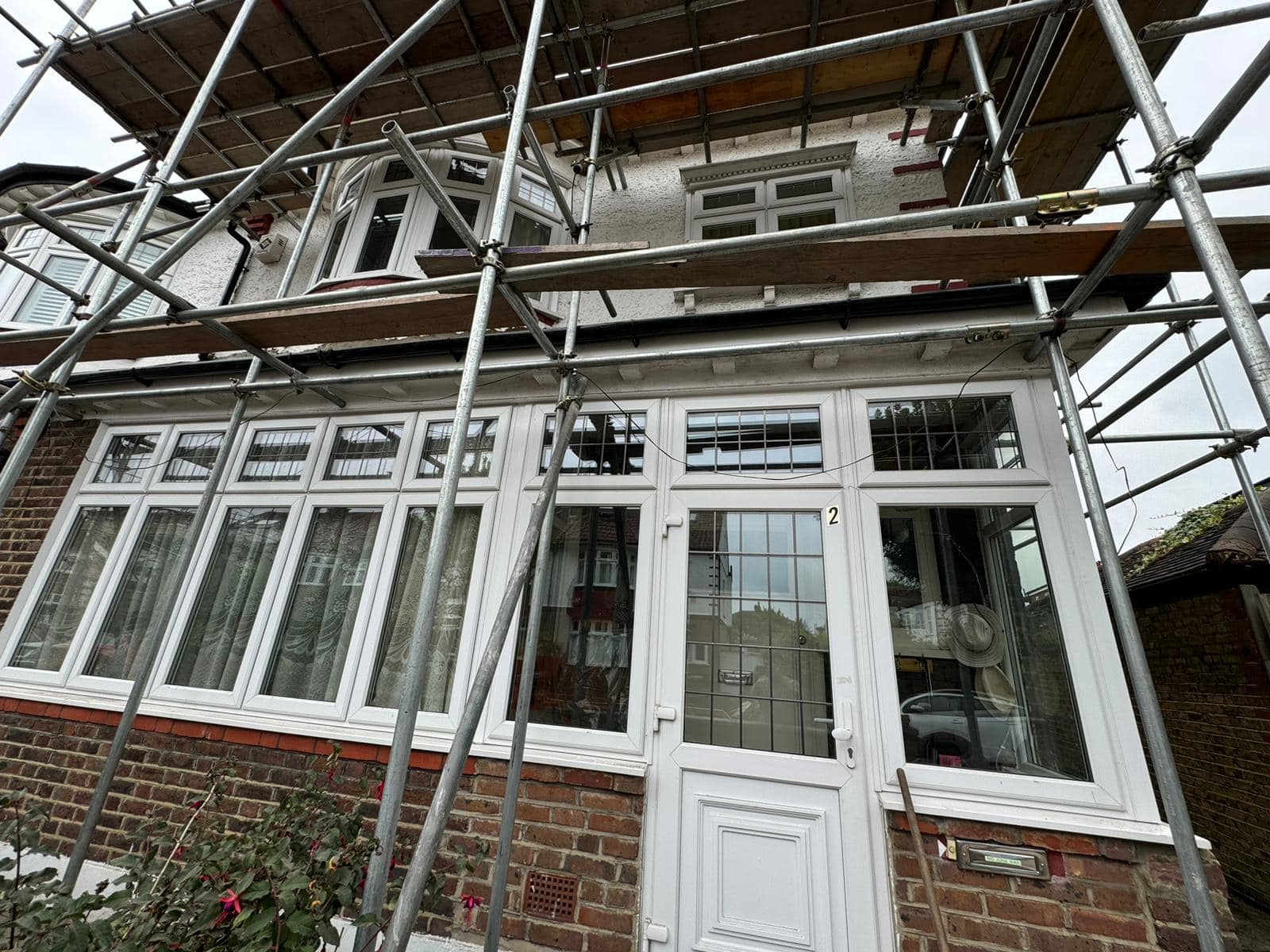 Professional roofers working on a property in London - KS Roof Master