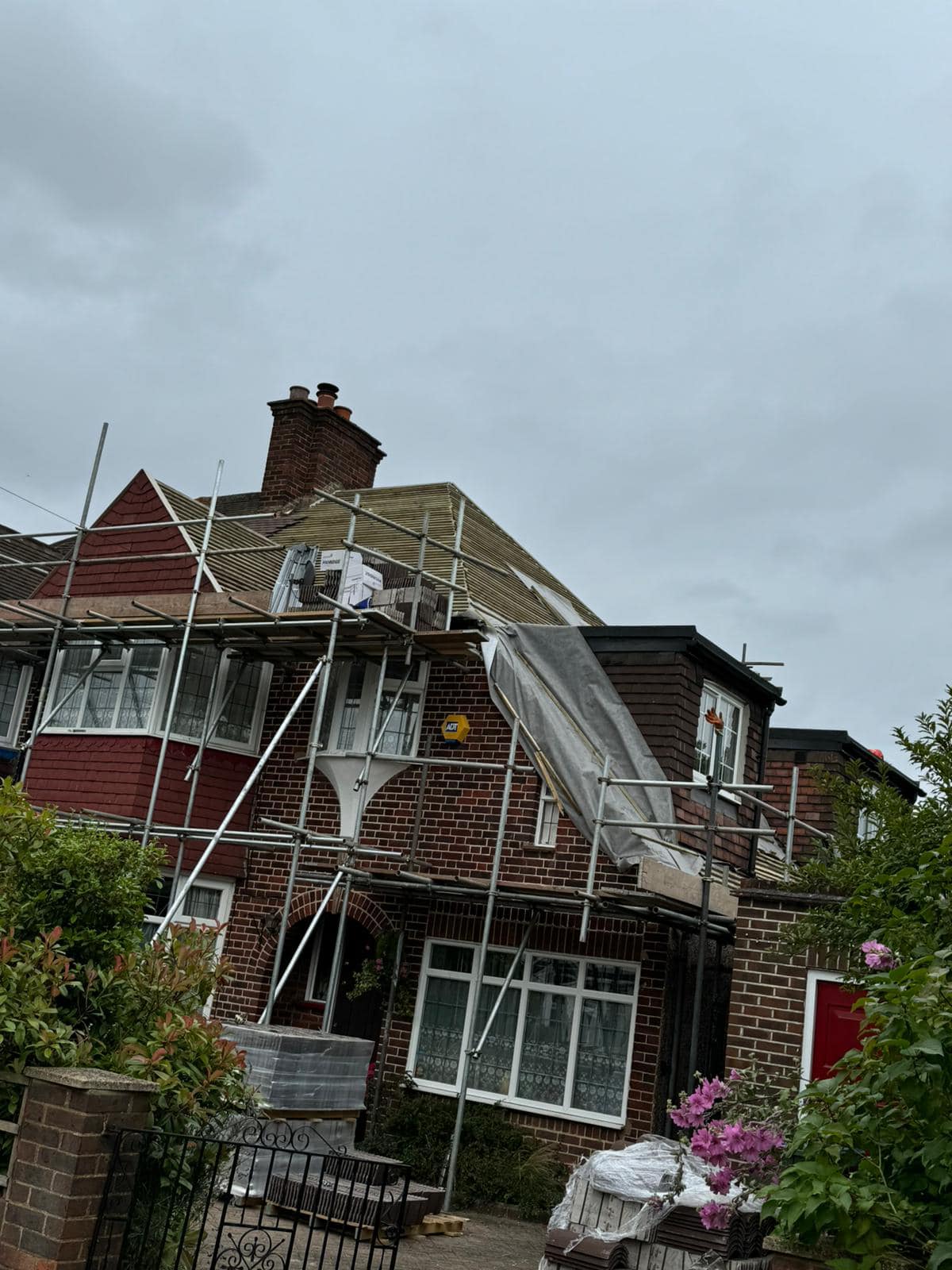 Professional roofers working on a property in London - KS Roof Master