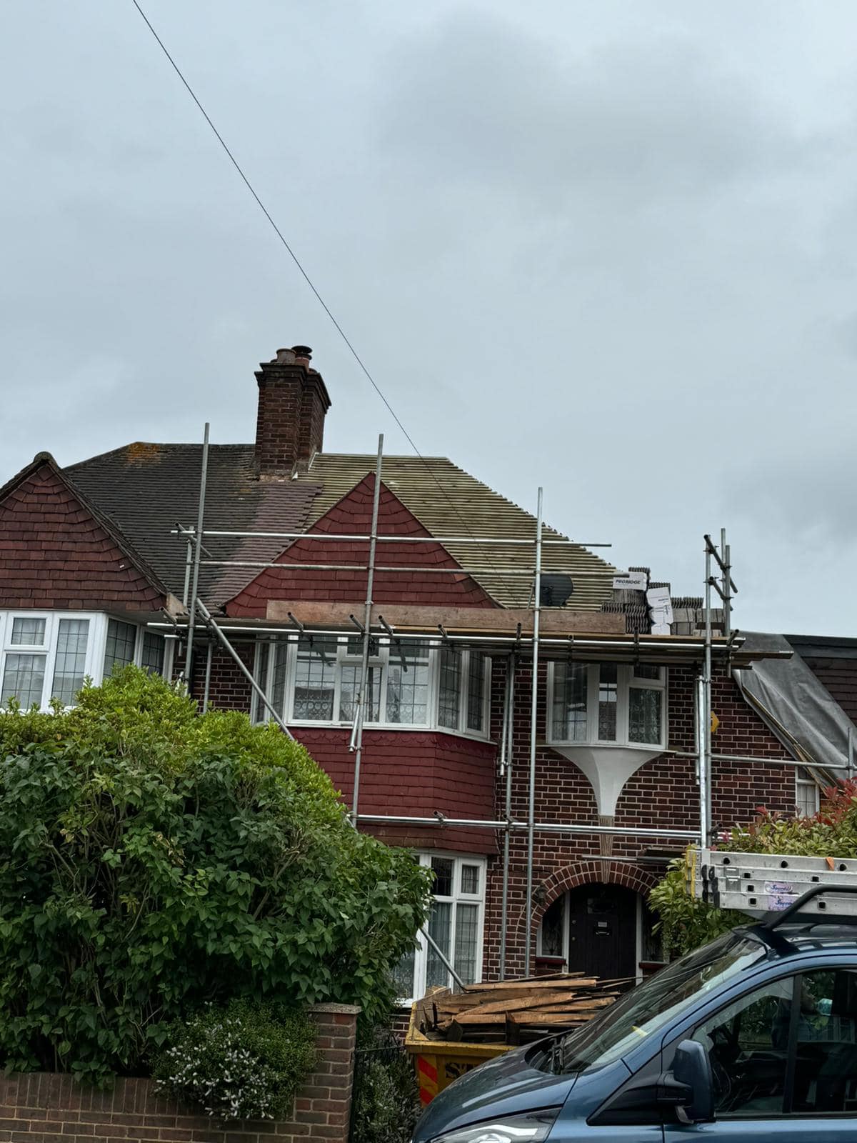 Professional roofers working on a property in London - KS Roof Master