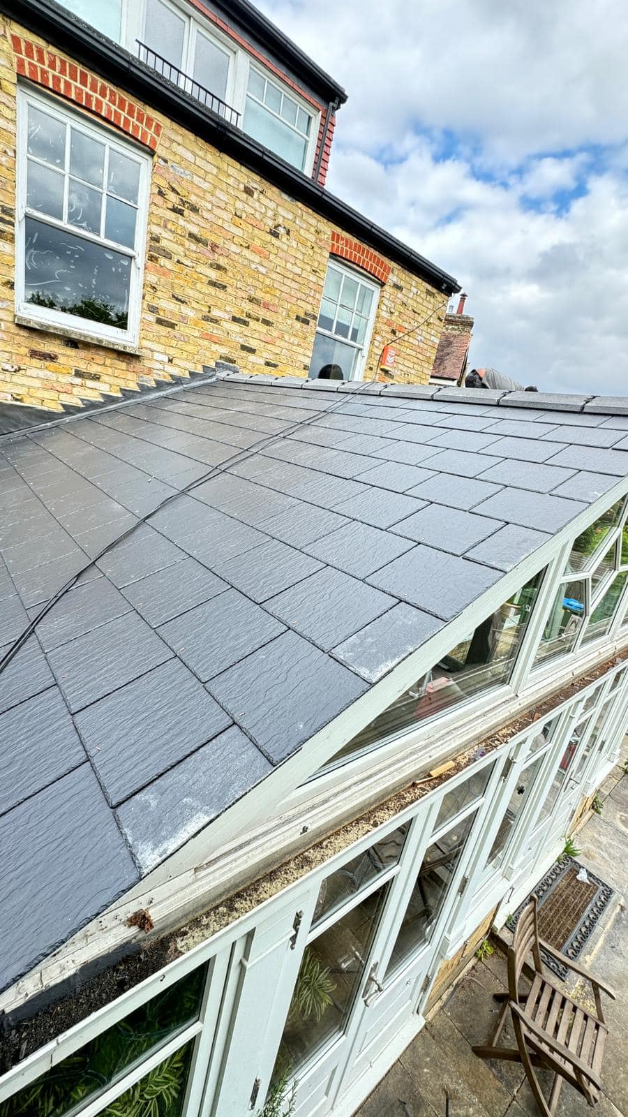 Professional roofers working on a property in London - KS Roof Master
