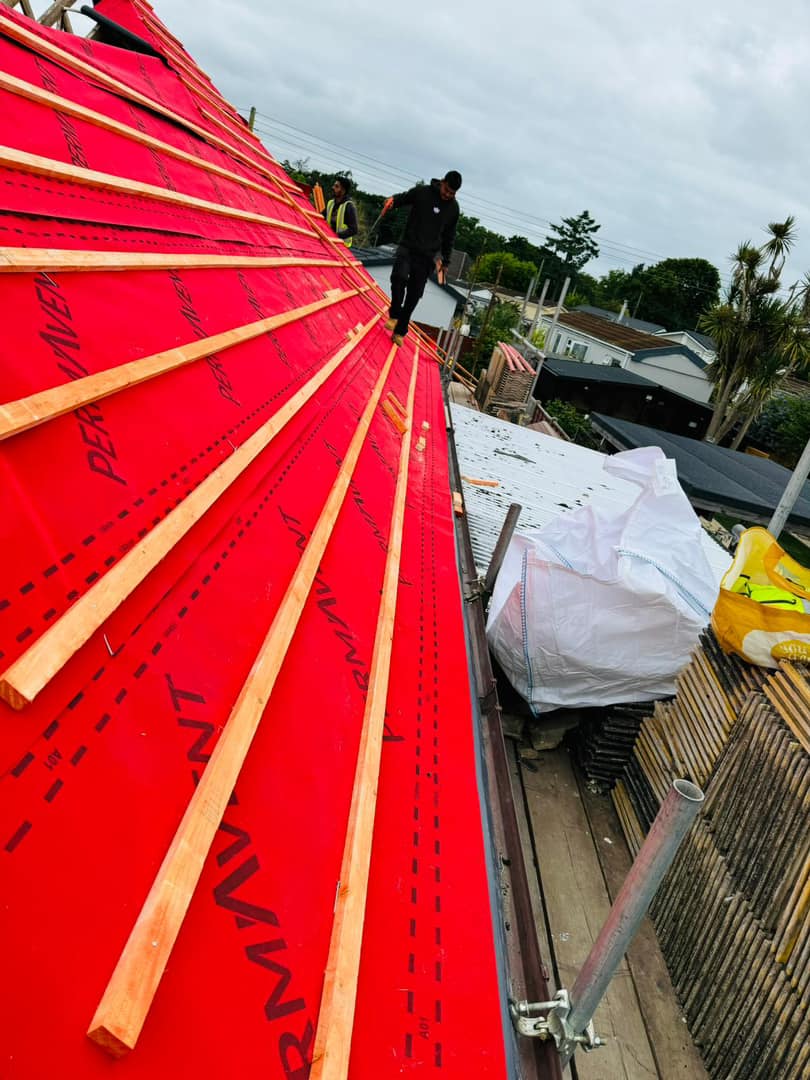 Professional roofers working on a property in London - KS Roof Master