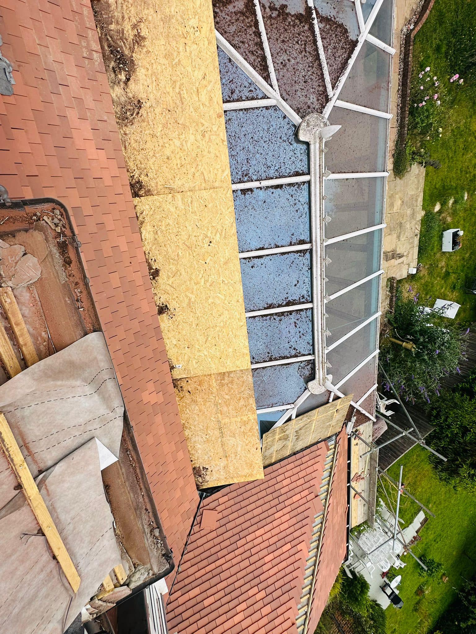 Professional roofers working on a property in London - KS Roof Master