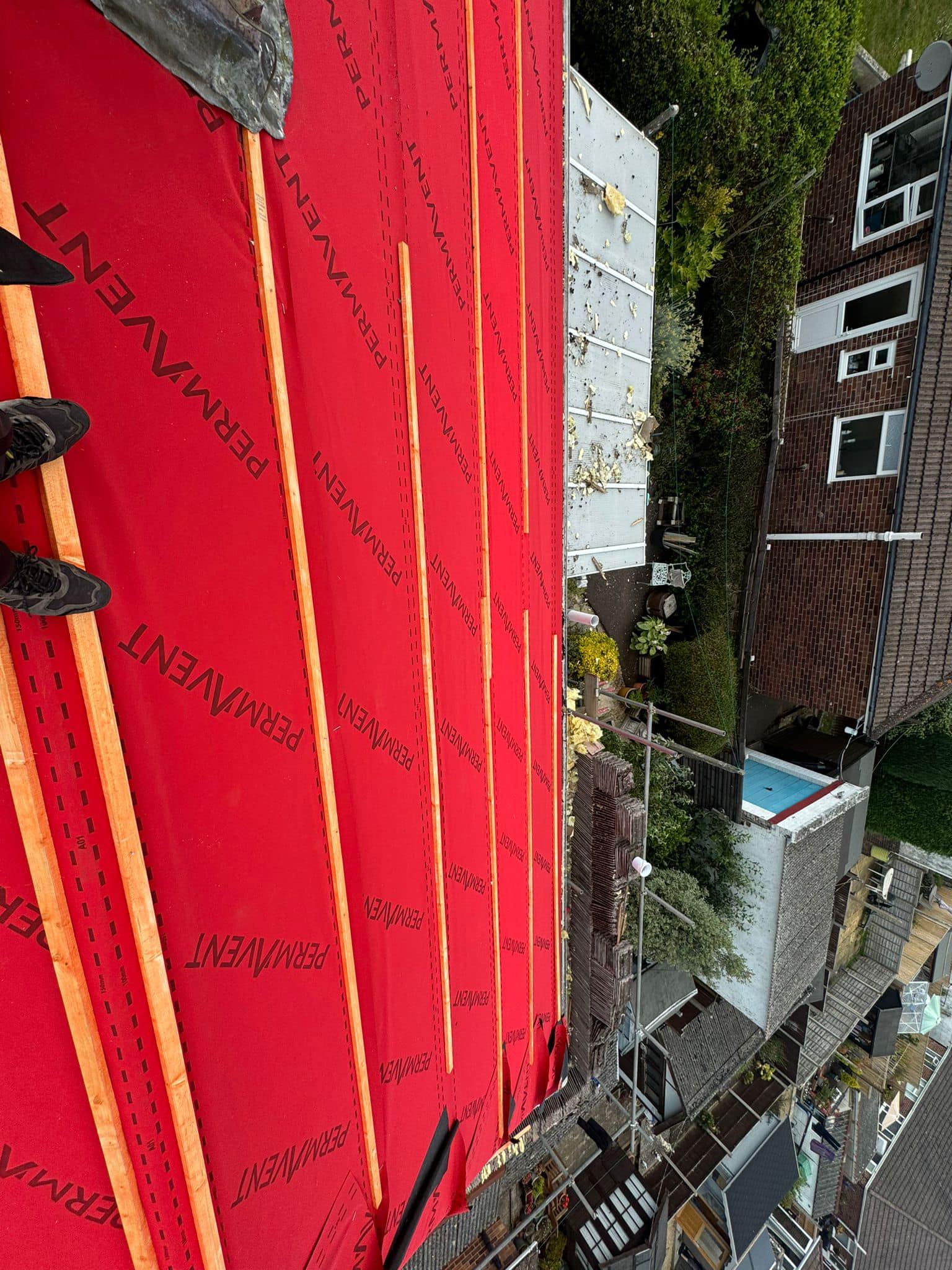 Professional roofers working on a property in London - KS Roof Master