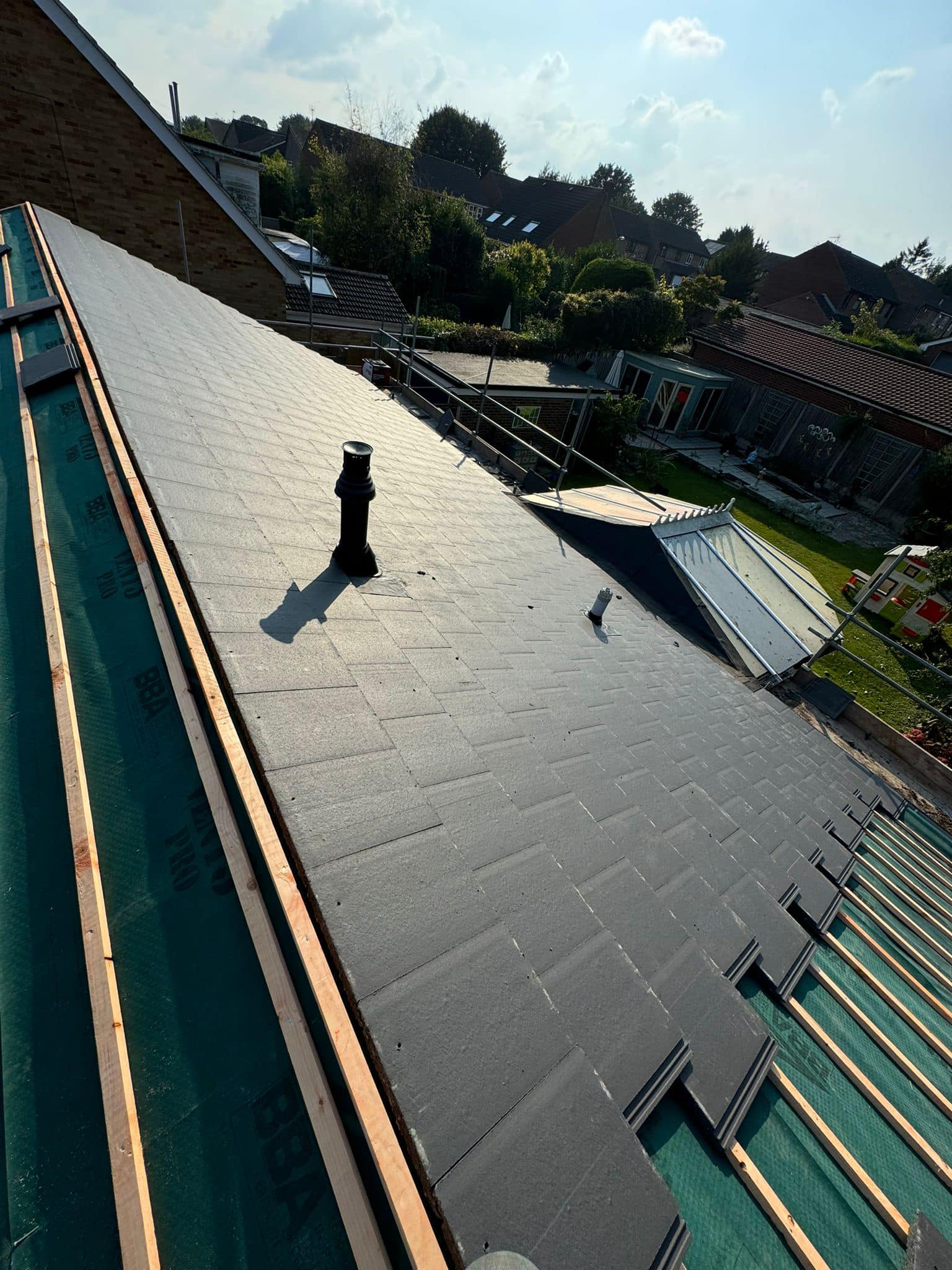 Professional roofers working on a property in London - KS Roof Master